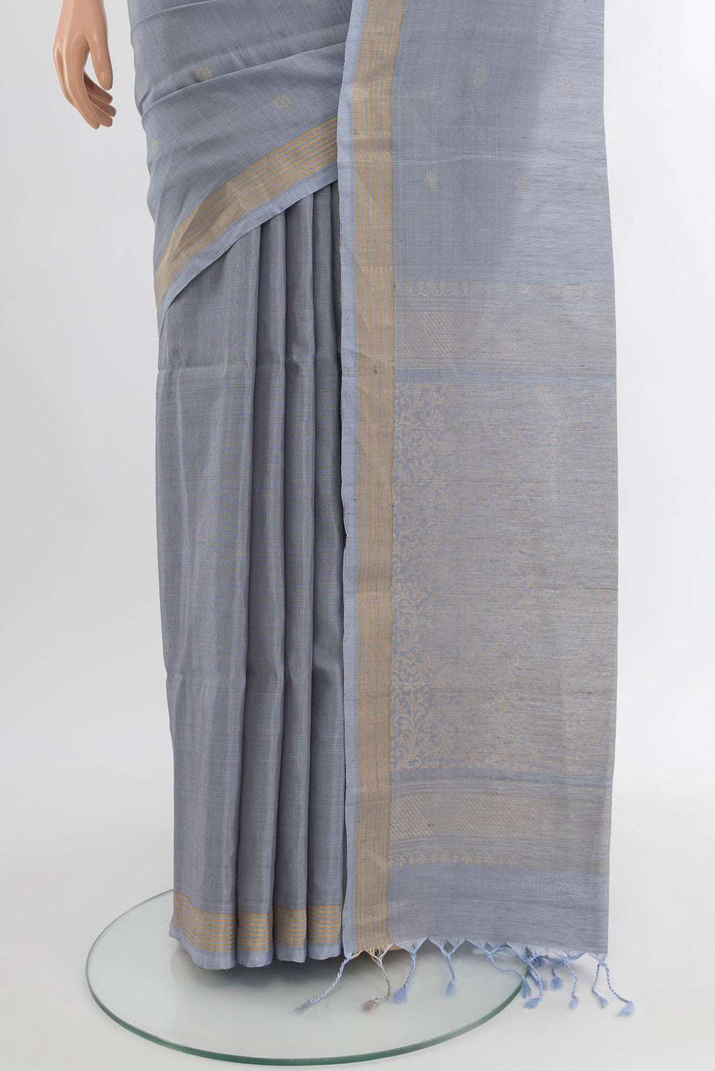 Pleats and pallu of Blue Grey Soft Silk Saree with Zari Butta on the body and Silk Border. 