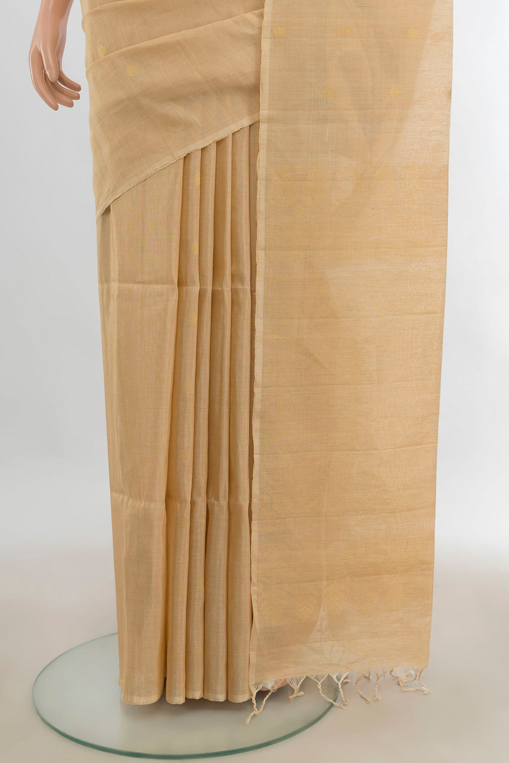 Pleats and pallu of Golden Soft Saree with Zari Butta on the body and Silk Border. 