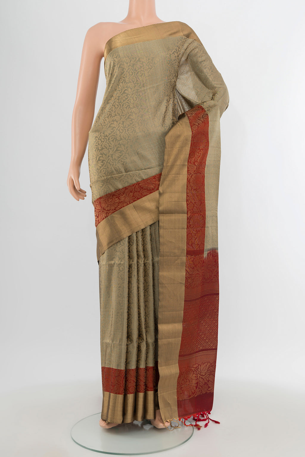 Davys Grey Soft Silk Saree with Zari Brocade on the body and Zari Border.  displayed on a mannequin