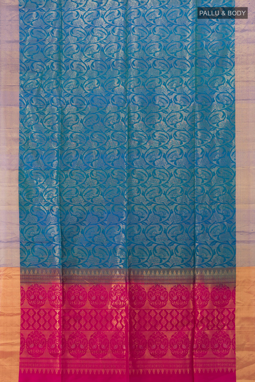 Flat view of Peacock Blue Soft Silk Saree with Zari Butta on the body and Silk Border. 