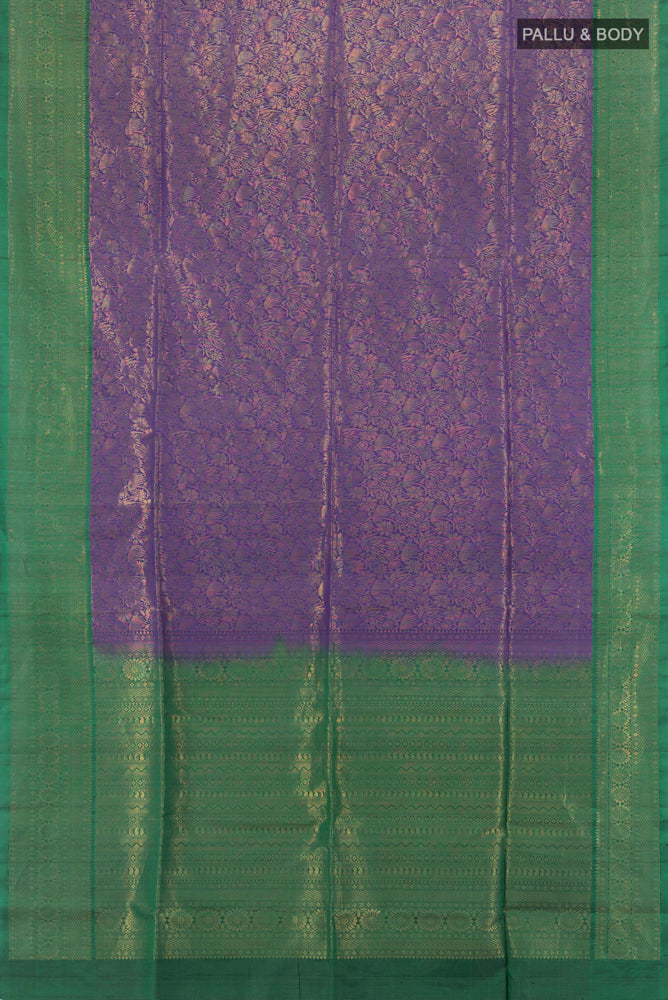 Flat view of Violet Soft Silk Saree with Zari Butta on the body and Silk Border. 