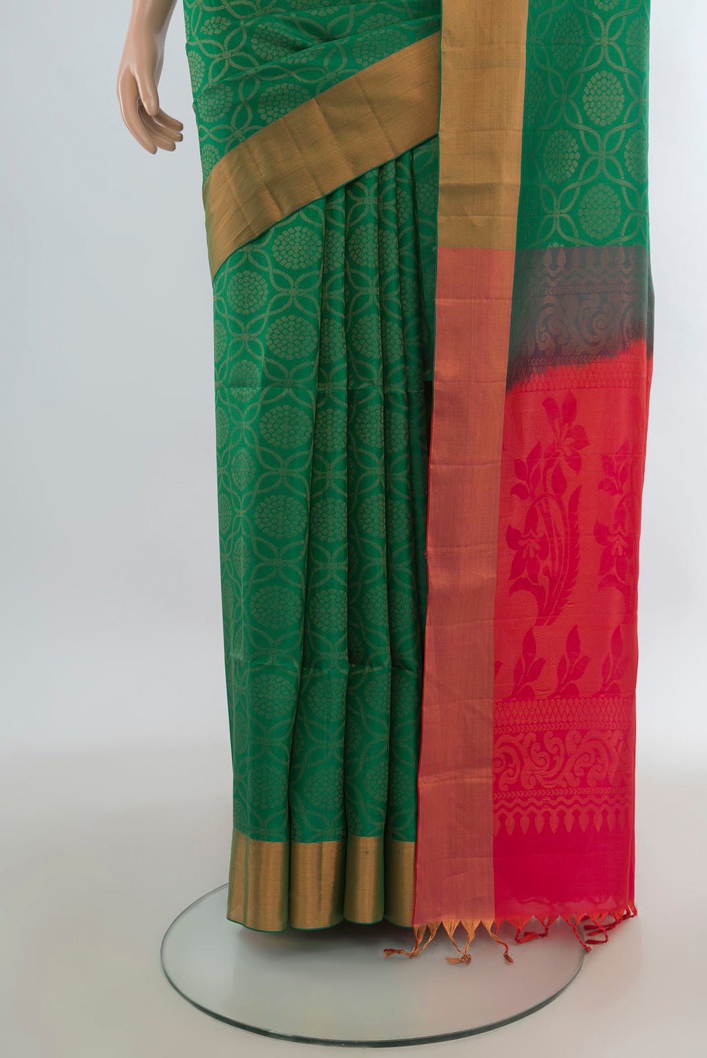 Pleats and pallu of Pure Silk Green Soft Saree with Zari Butta on the body and Zari Border. 