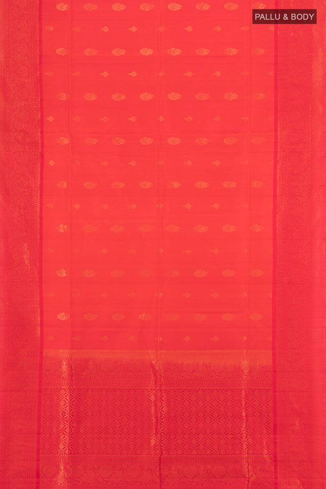 Flat view of Peach Soft Silk Saree with Zari Butta on the body and Silk Border. 