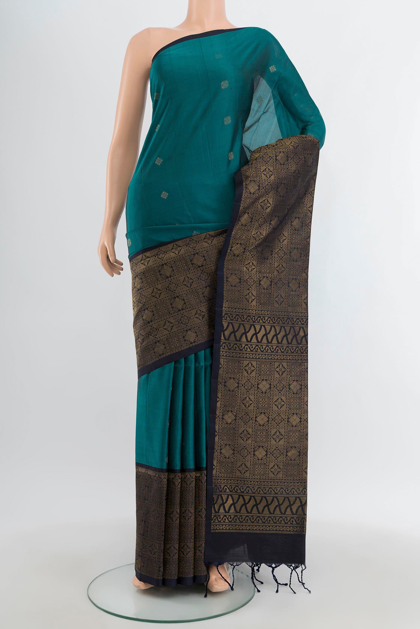 Dark Blue Soft Silk Saree with Zari Butta on the body and Fancy Border.  displayed on a mannequin