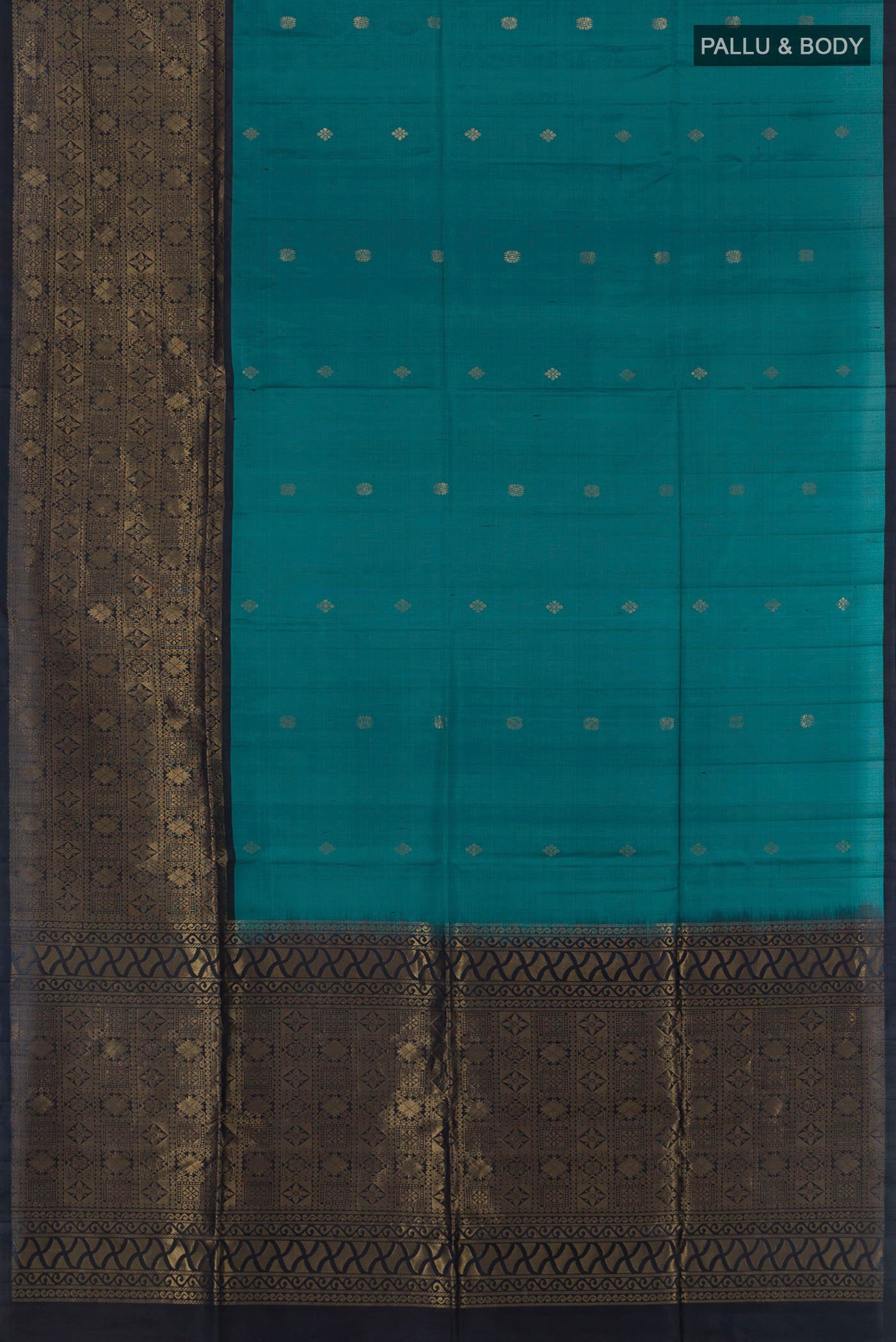 Flat view of Dark Blue Soft Silk Saree with Zari Butta on the body and Fancy Border. 