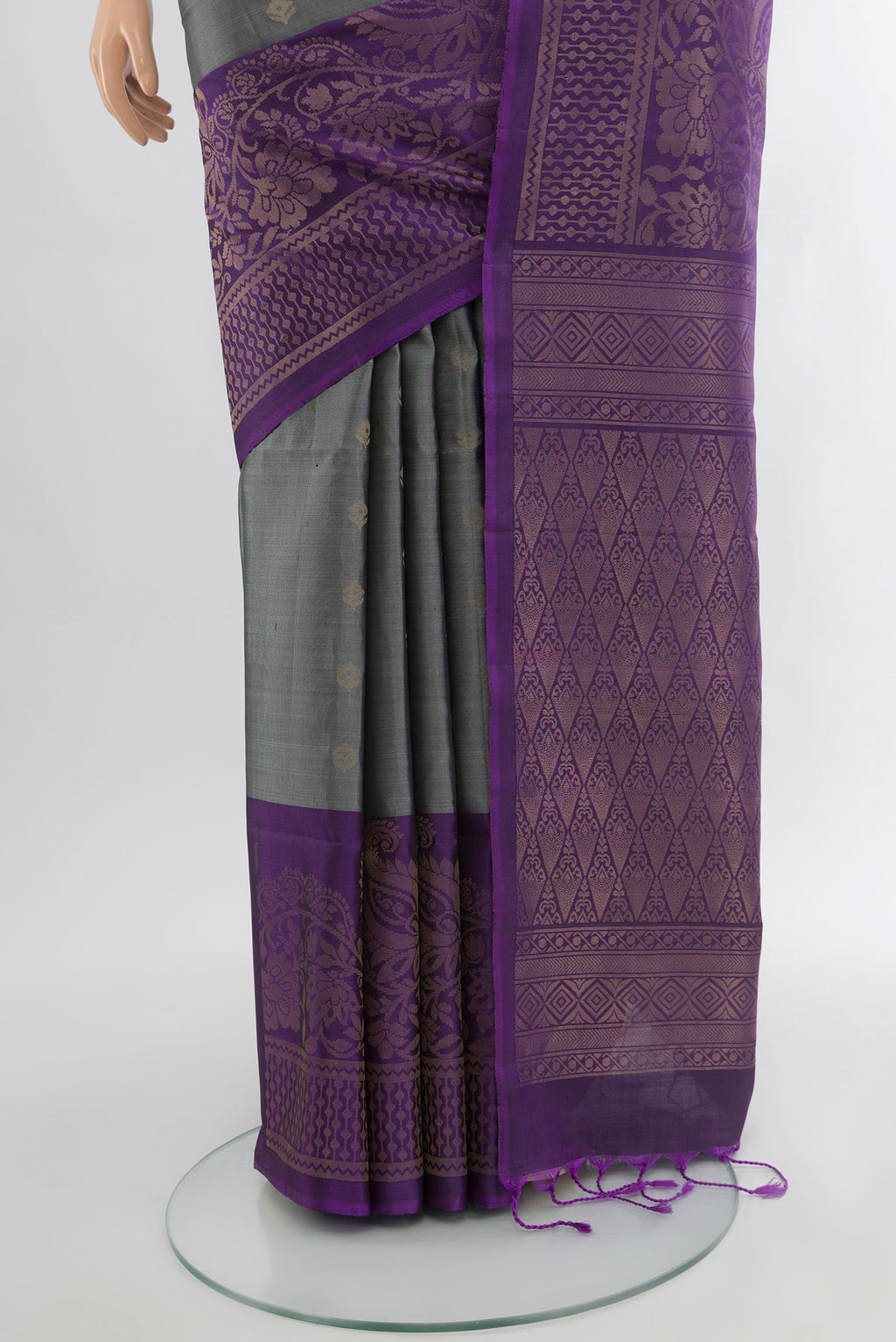 Pleats and pallu of Davys Grey Soft Silk Saree with Zari Butta on the body and Silk Border. 