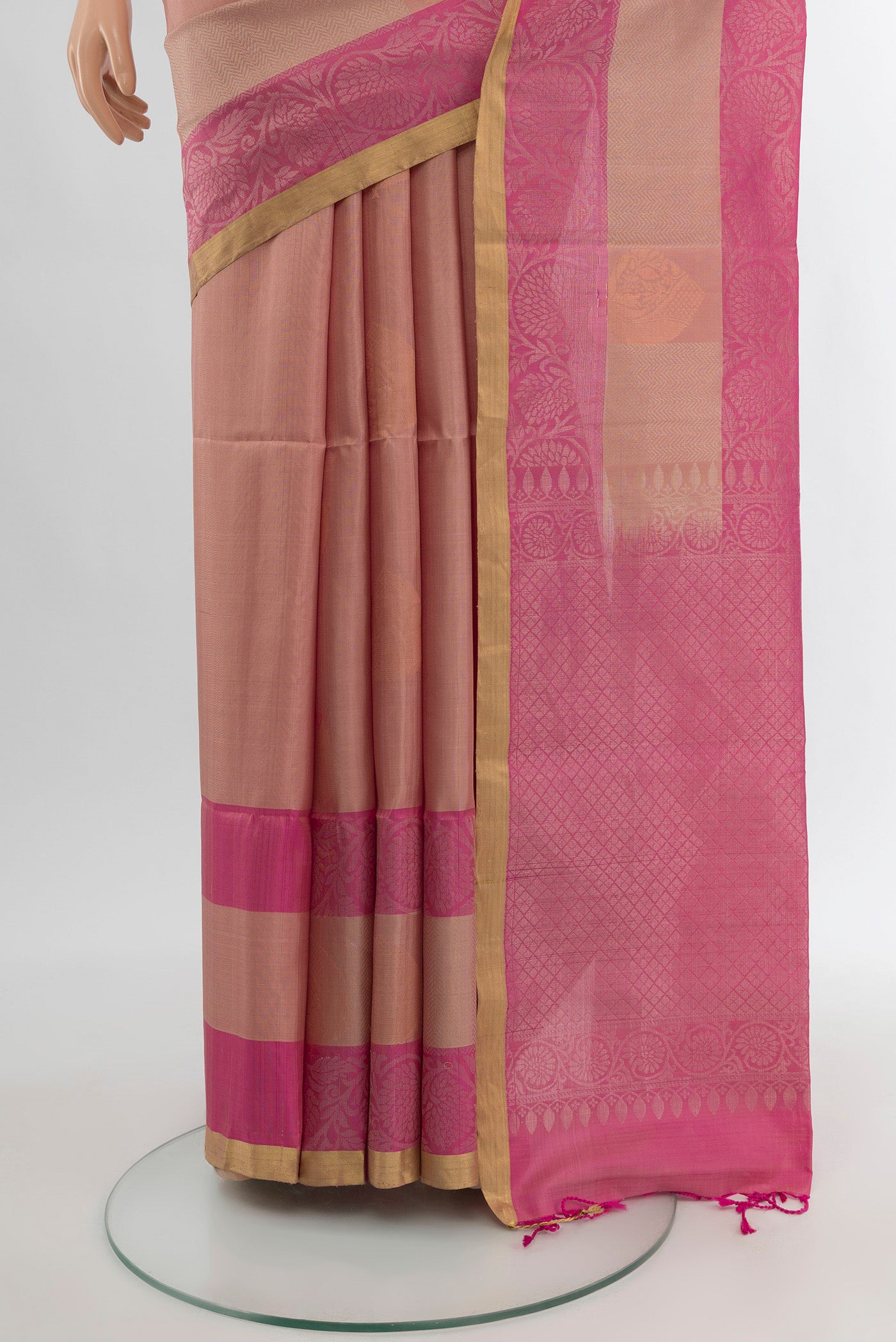 Pleats and pallu of Bronze Soft Silk Saree with Zari Butta on the body and Silk Border. 