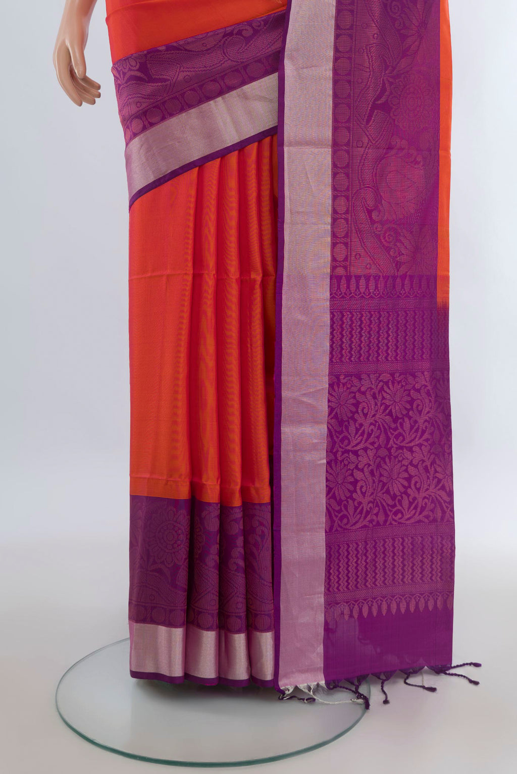Pleats and pallu of Pure Silk Brick Orange Soft Saree with Zari Butta on the body and Zari Border. 