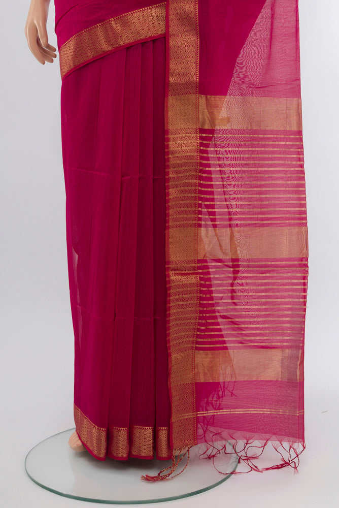 Pleats and pallu of Dark Pink Maheshwari Silk Cotton Saree with Zari Butta on the body and Silk Border. 