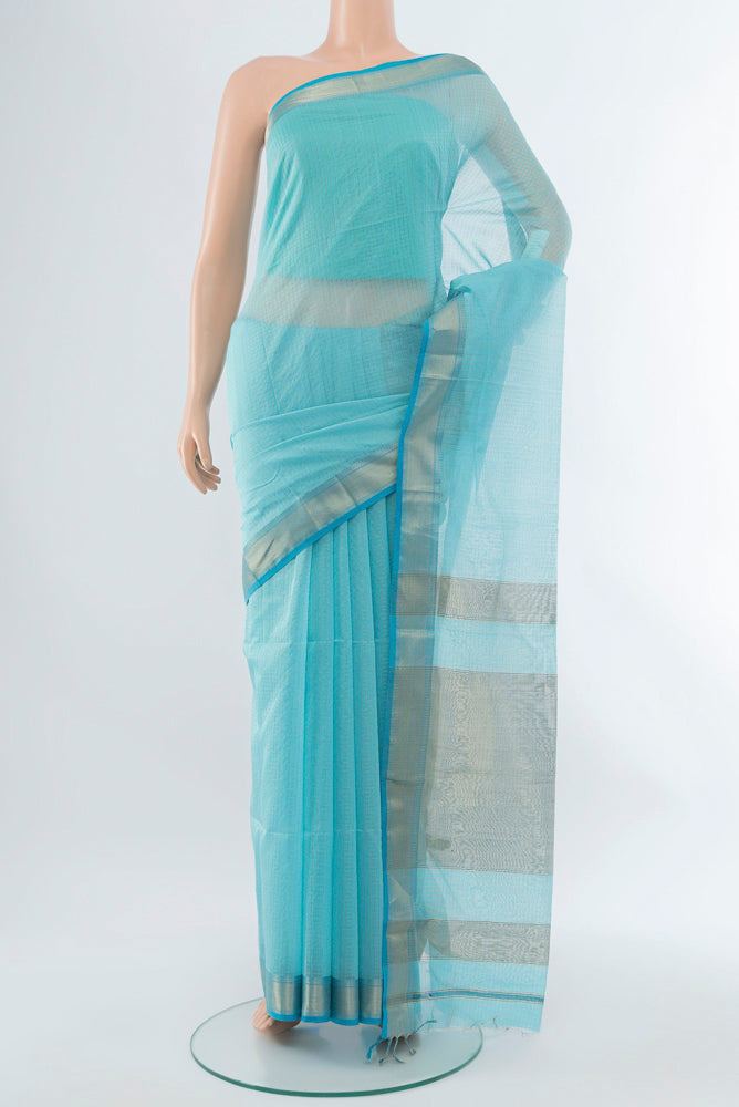 Sky Blue Maheshwari Silk Cotton Saree with Zari Butta on the body and Silk Border.  displayed on a mannequin