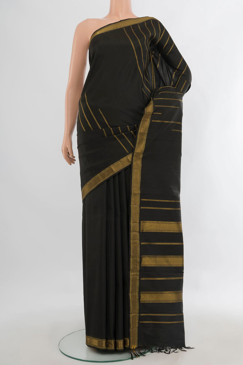 Pure Silk Black Kanchipuram Saree with Stripes on the body and Zari Border.  displayed on a mannequin