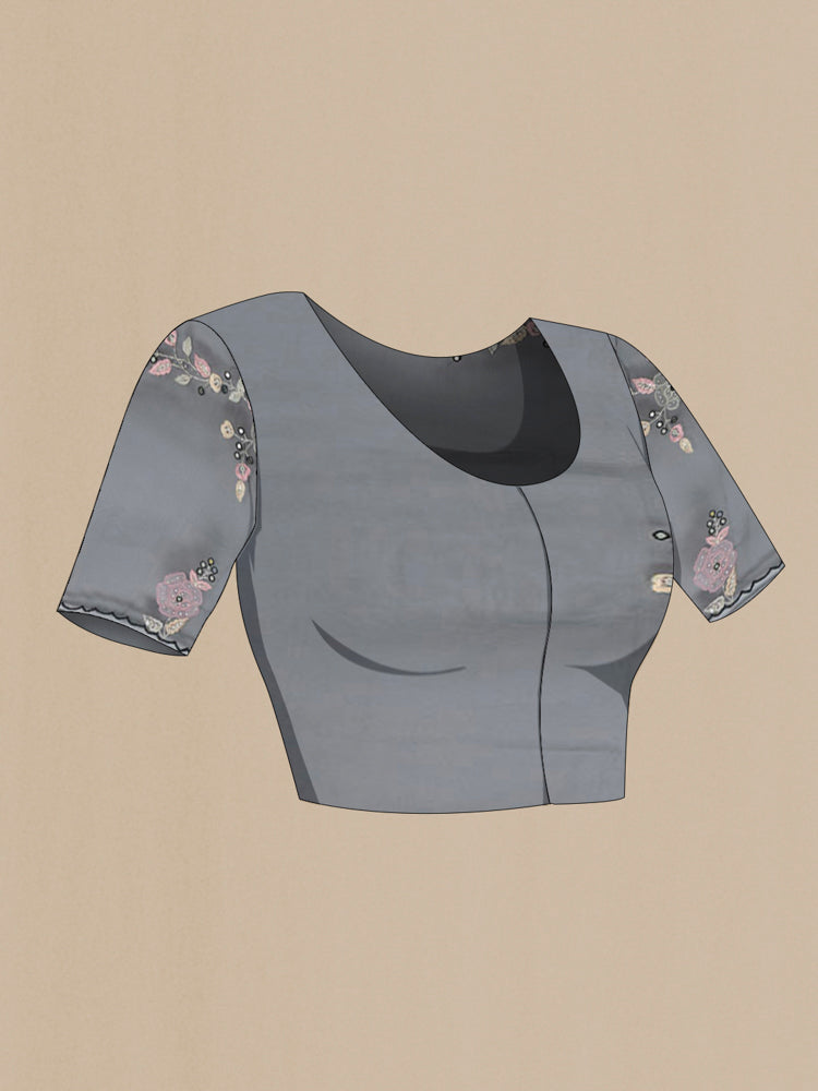Close up image of the blouse of Black Art Silk Saree with Embroidery on the body and Silk Border. 