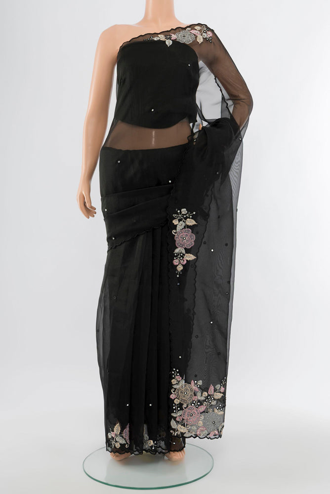 Black Art Silk Saree with Embroidery on the body and Silk Border.  displayed on a mannequin