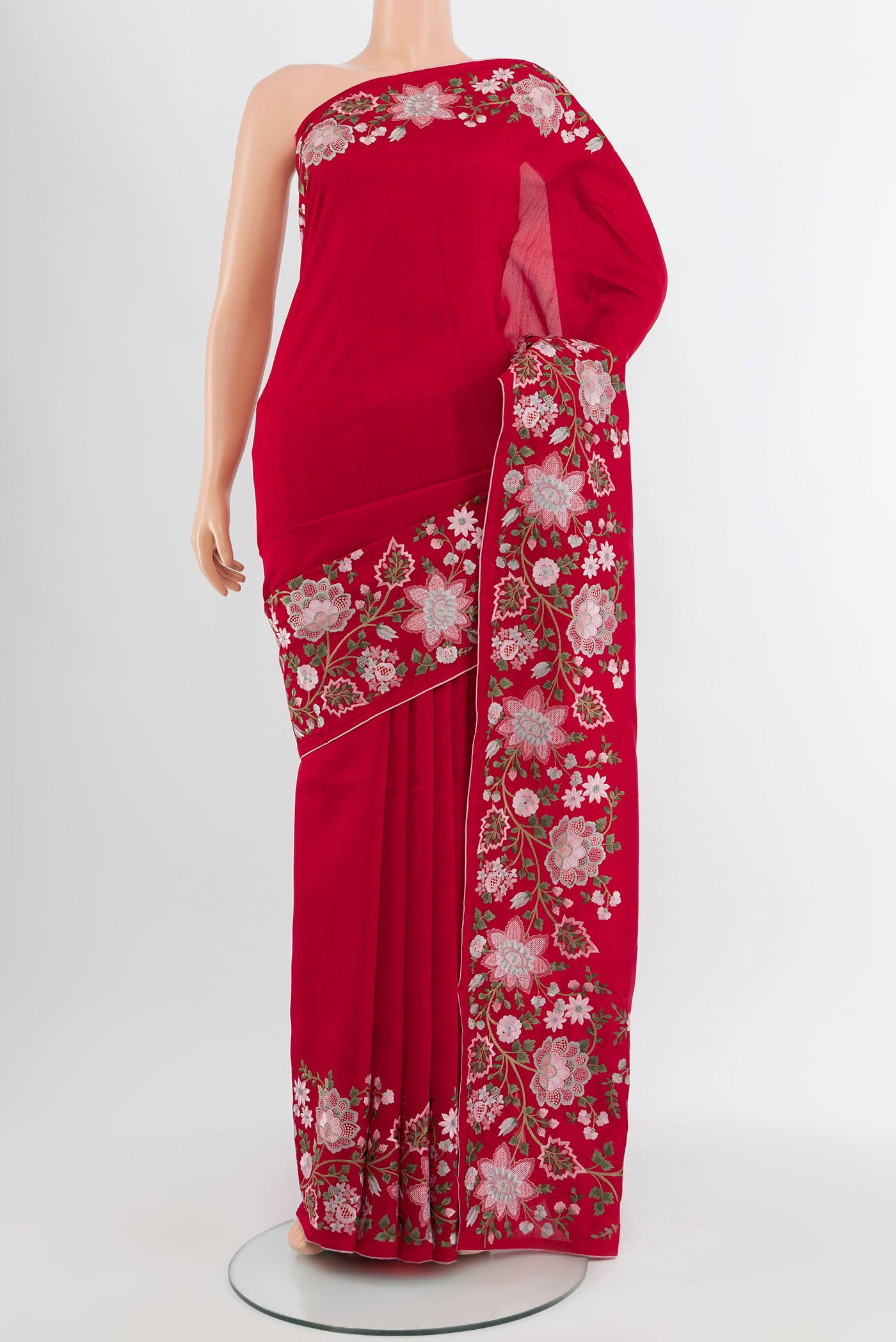 Red Art Silk Saree with Embroidery on the body and Silk Border.  displayed on a mannequin