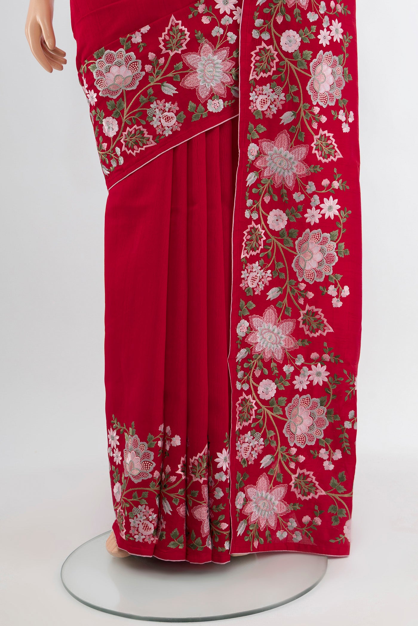 Pleats and pallu of Red Art Silk Saree with Embroidery on the body and Silk Border. 