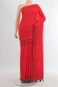 Orange Blended Art Silk Saree with Embroidery on the body and Embroidery Border.  displayed on a mannequin