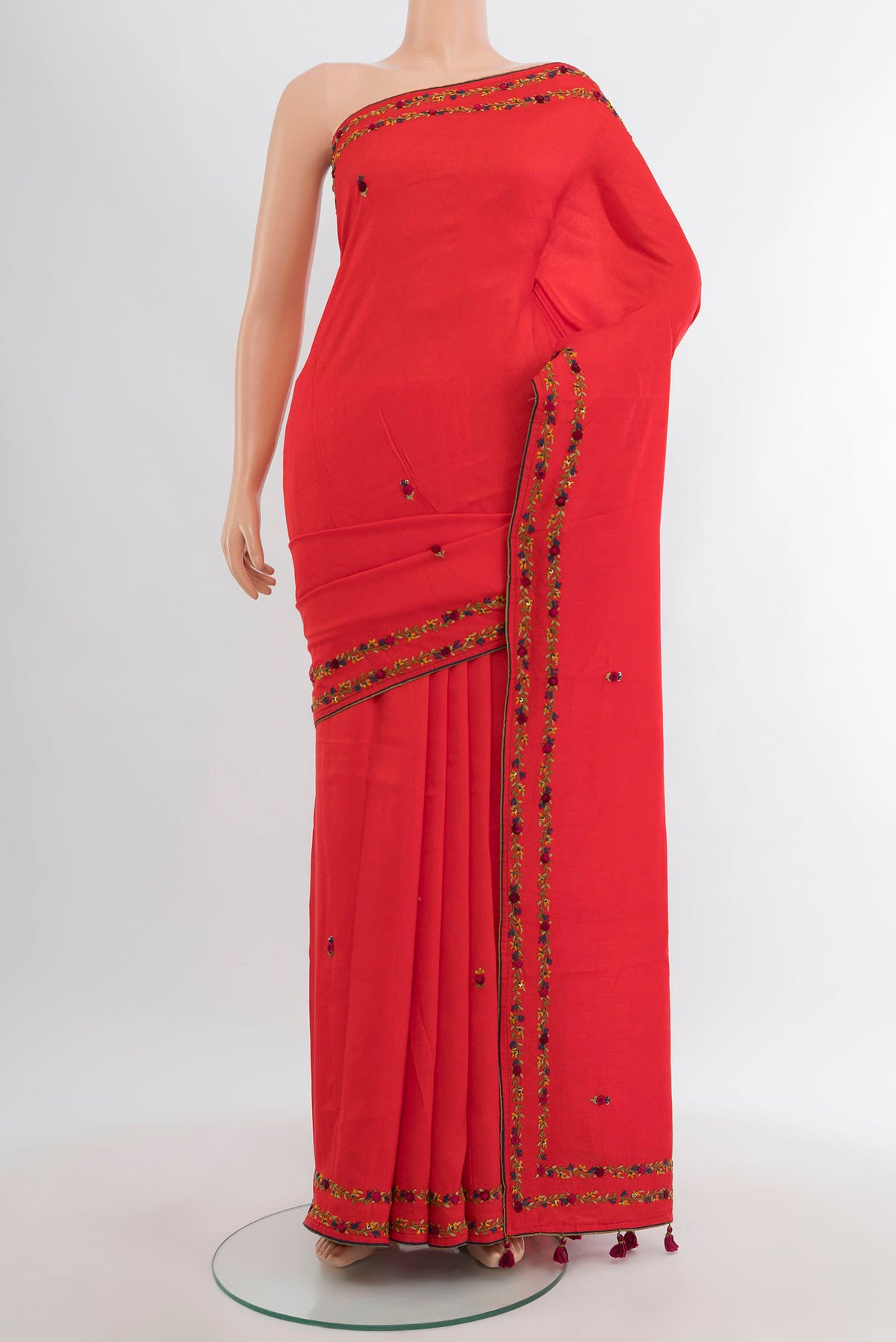 Orange Blended Art Silk Saree with Embroidery on the body and Embroidery Border.  displayed on a mannequin