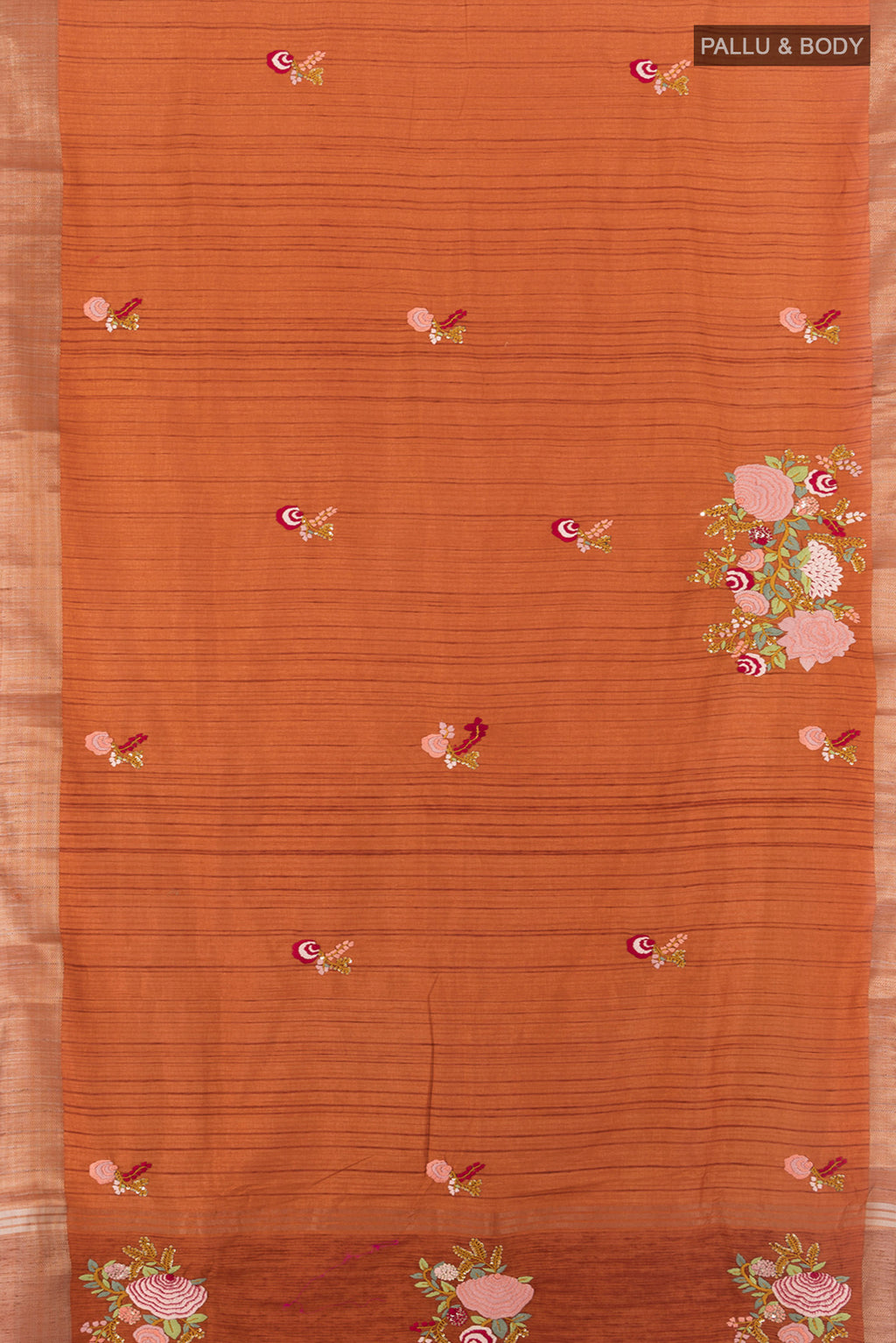 Flat view of Rust Blended Art Silk Saree with Embroidery on the body and Zari Border. 