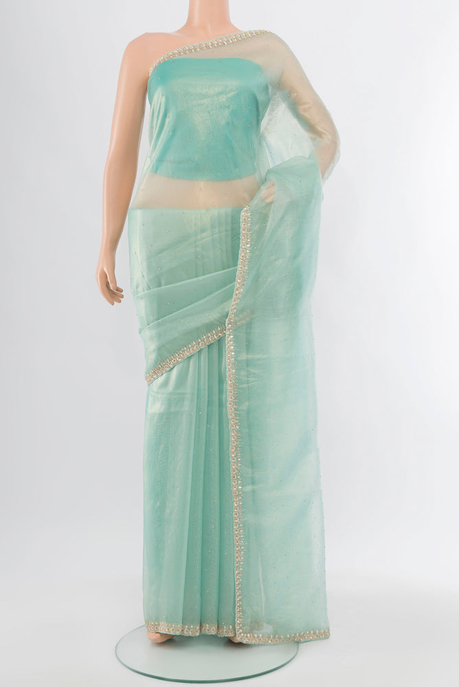 Sky Blue Art Silk Saree with Embroidery on the body and Silk Border.  displayed on a mannequin
