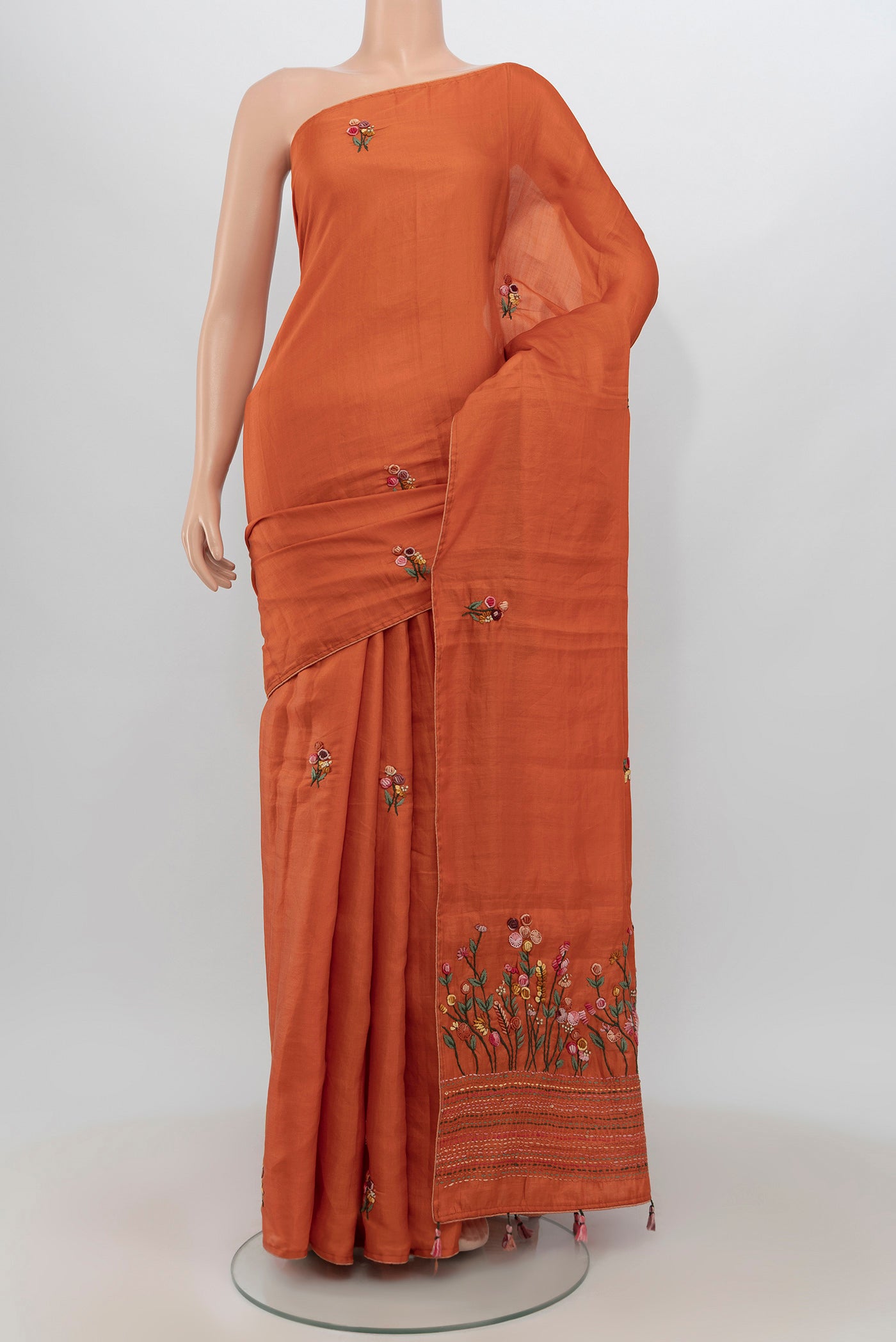 Orange Blended Art Silk Saree with Embroidery on the body and Embroidery Border.  displayed on a mannequin