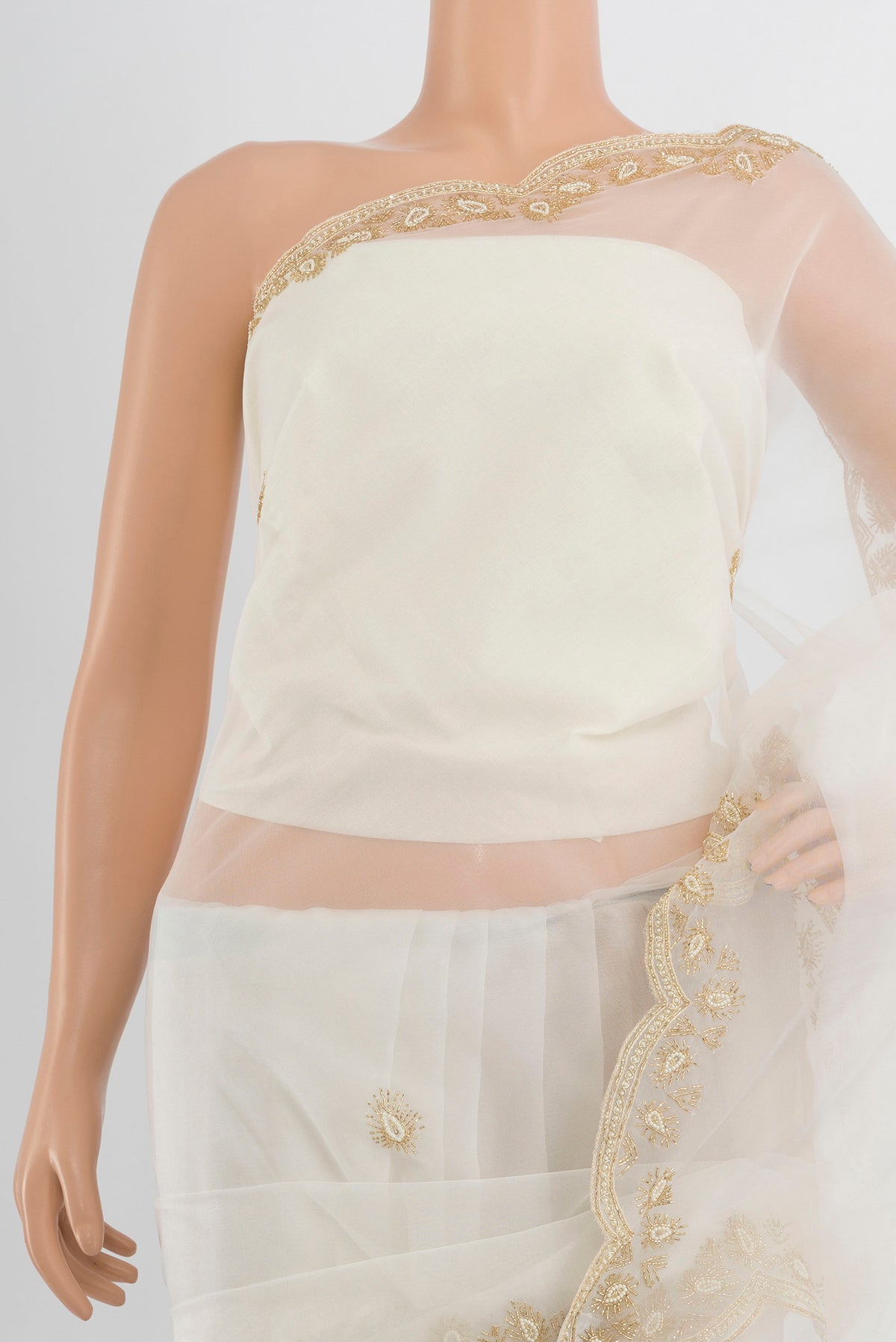 Border image of Cream Embroidery Net Saree with Embroidery on the body and Silk Border. 