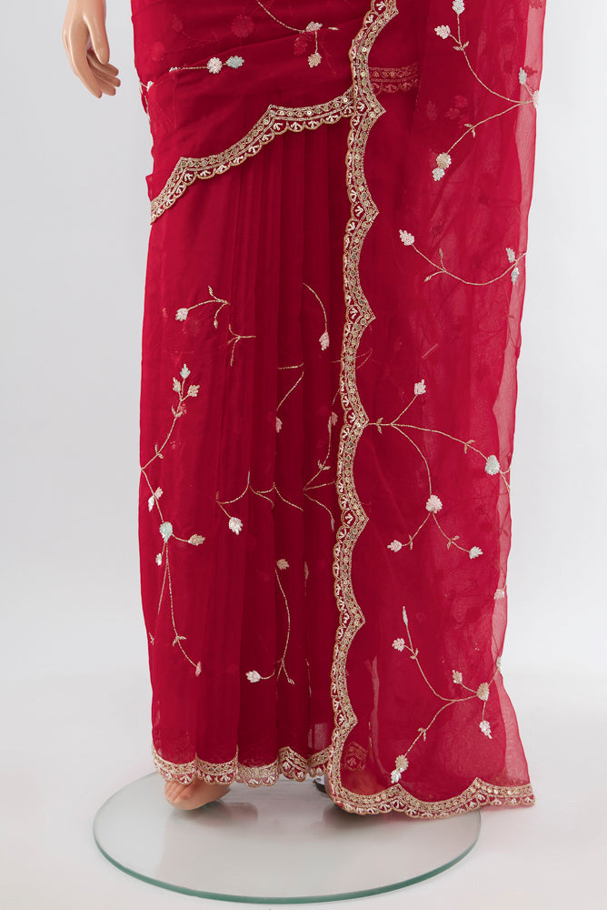 Pleats and pallu of Red Art Silk Saree with Embroidery on the body and Silk Border. 