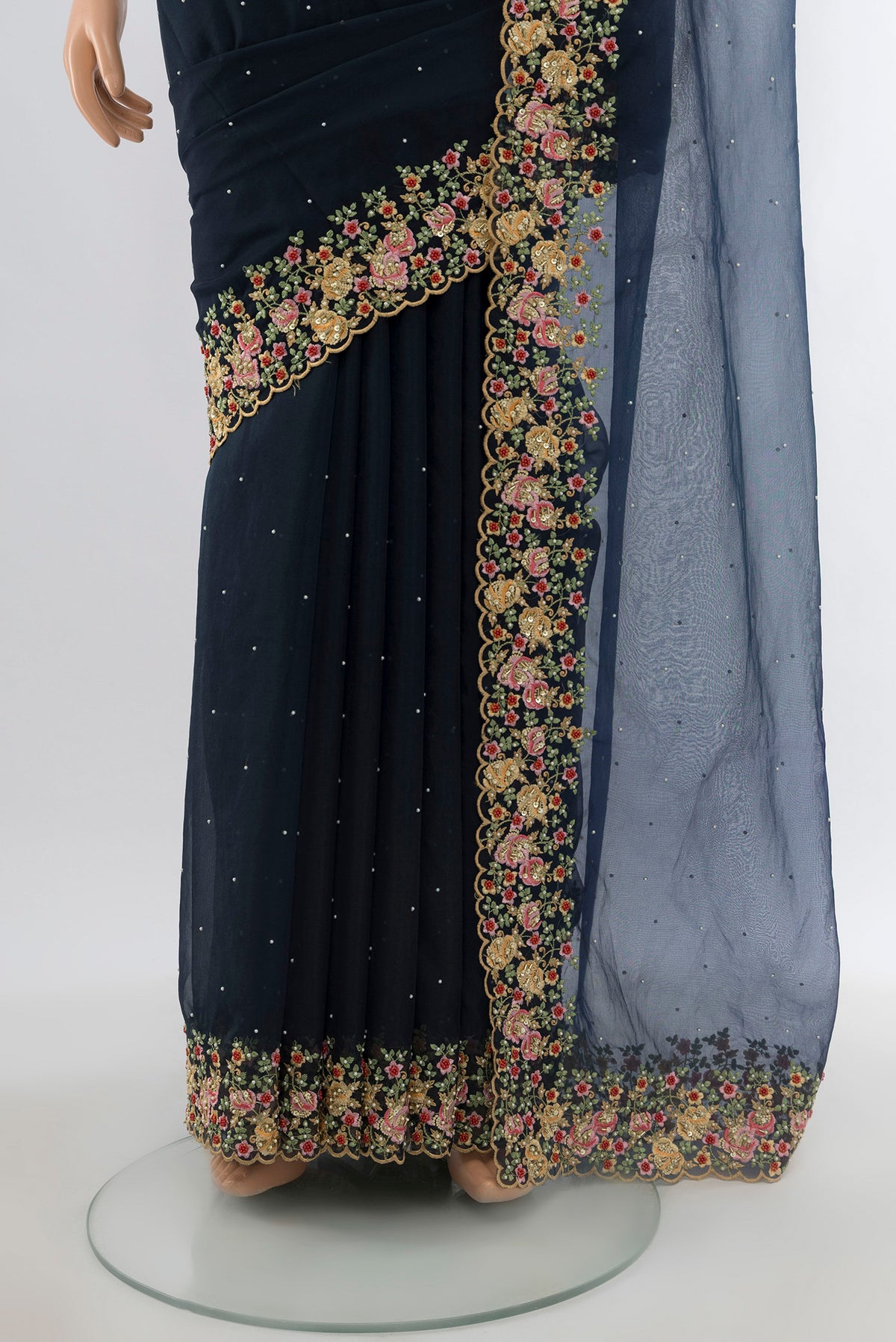 Pleats and pallu of Navy Blue Blended Embroidery Net Saree with Embroidery on the body and Embroidery Border. 
