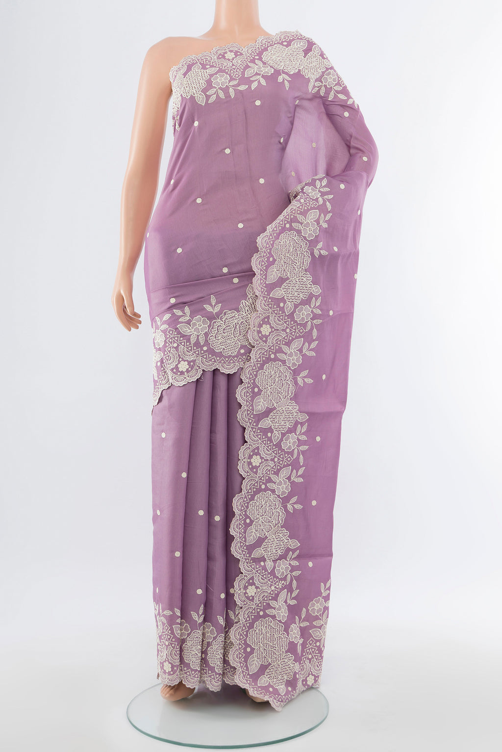 Lavender Art Silk Saree with Embroidery on the body and Silk Border.  displayed on a mannequin