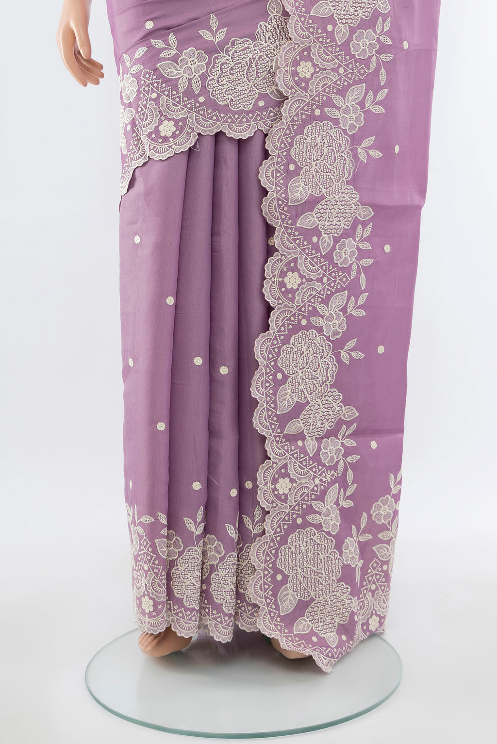 Pleats and pallu of Lavender Art Silk Saree with Embroidery on the body and Silk Border. 