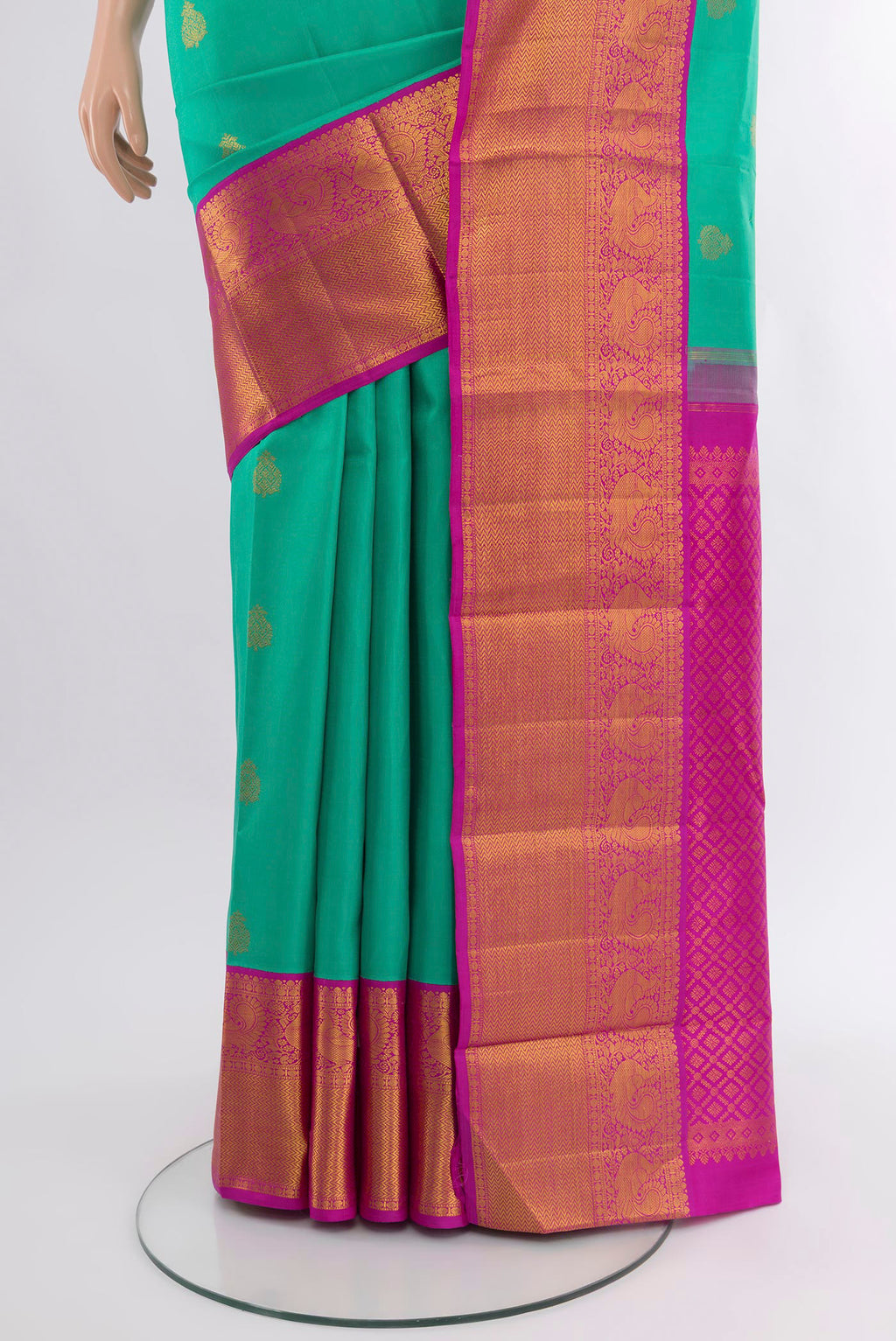 Pleats and pallu of Turquoise Kanjivaram Silk Saree with Zari Butta on the body and Zari Border. 