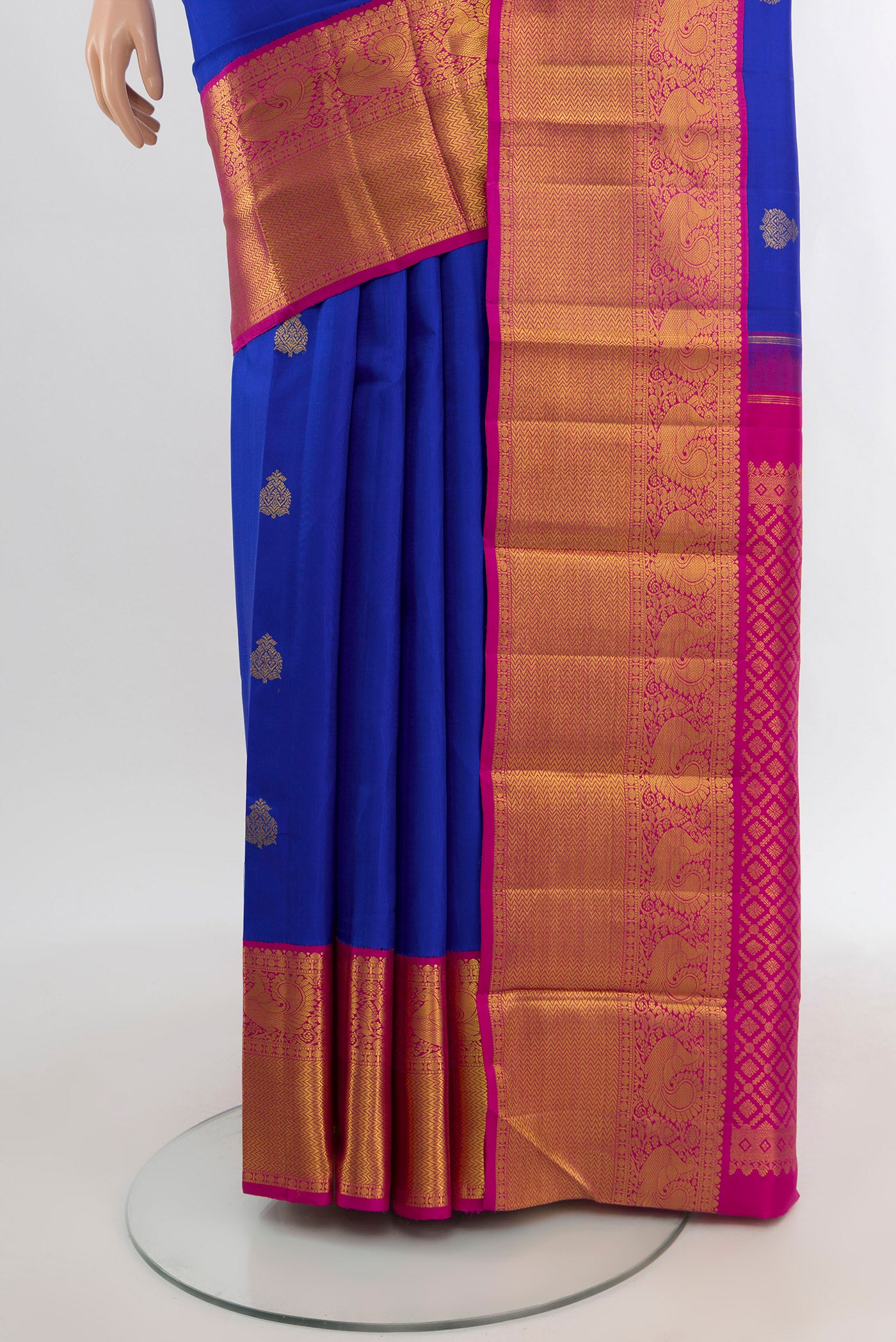 Pleats and pallu of Royal Blue Kanjivaram Silk Saree with Zari Butta on the body and Zari Border. 