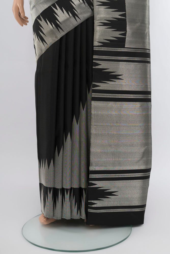 Pleats and pallu of Pure Silk Pure Zari Silver Kanchipuram Saree with Zari Butta on the body and Silk Border. 