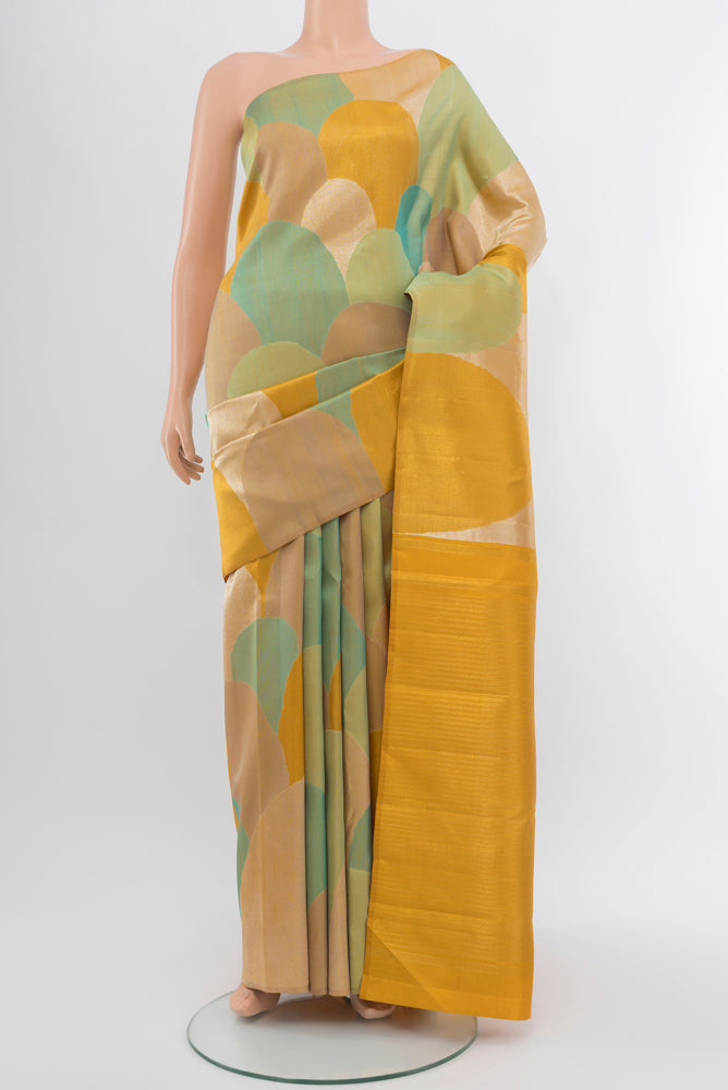 Pure Silk Pure Zari Multi Color Kanjivaram Saree with Zari Butta on the body and Silk Border.  displayed on a mannequin