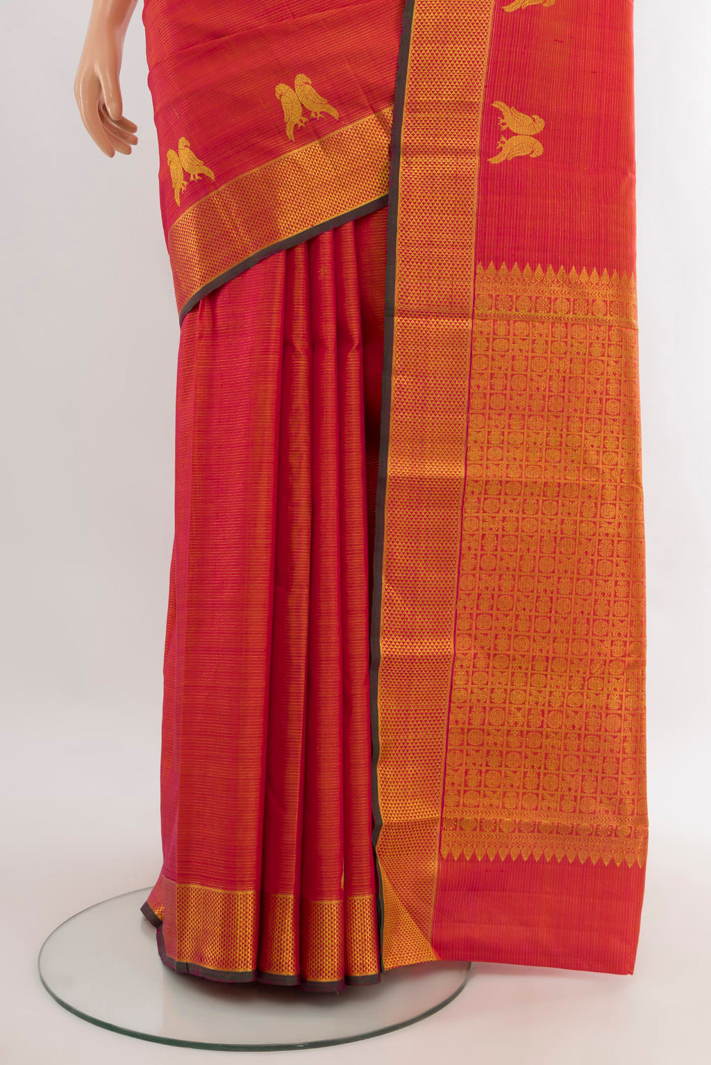 Pleats and pallu of Pink with Orange Color Kanjivaram Silk Saree with Stripes on the body and Zari Border. 