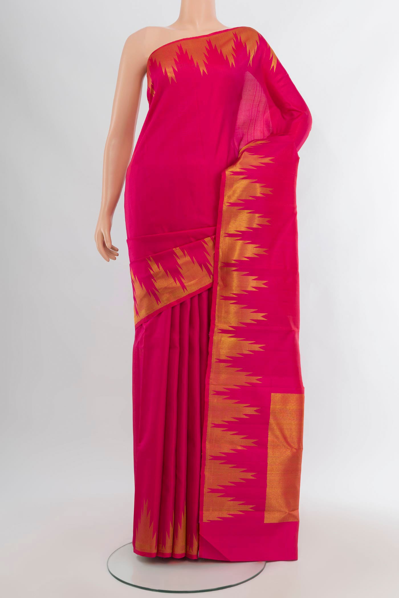 Pink Kanjivaram Silk Saree with Plain Body and Temple Border.  displayed on a mannequin