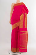 Pure Silk Pure Zari Rani Pink Kanjivaram Saree with Plain Body and Temple Border.  displayed on a mannequin