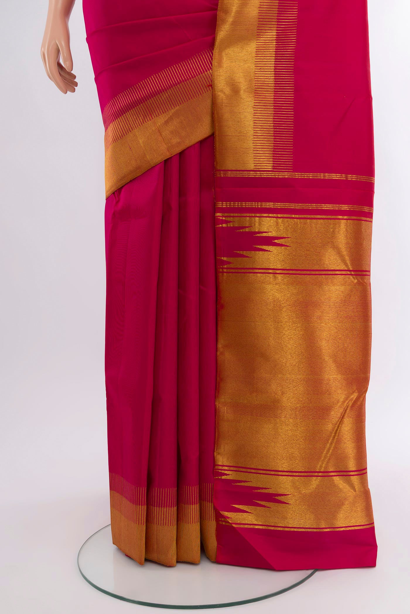 Pleats and pallu of Pink Kanjivaram Silk Saree with Plain Body and Zari Border. 