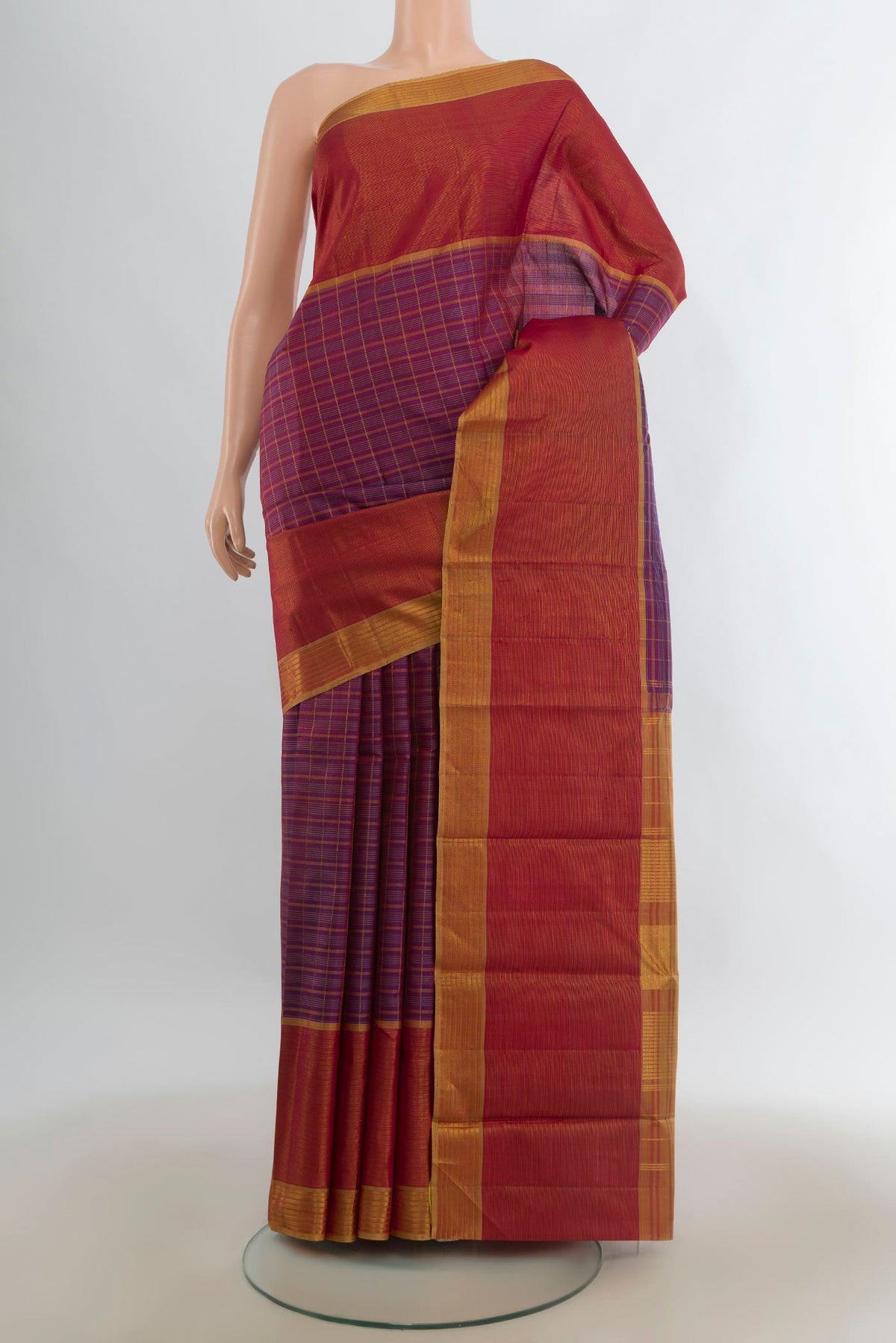 Pure Silk Purple Kanchipuram Saree with Zari Butta on the body and Zari Border.  displayed on a mannequin
