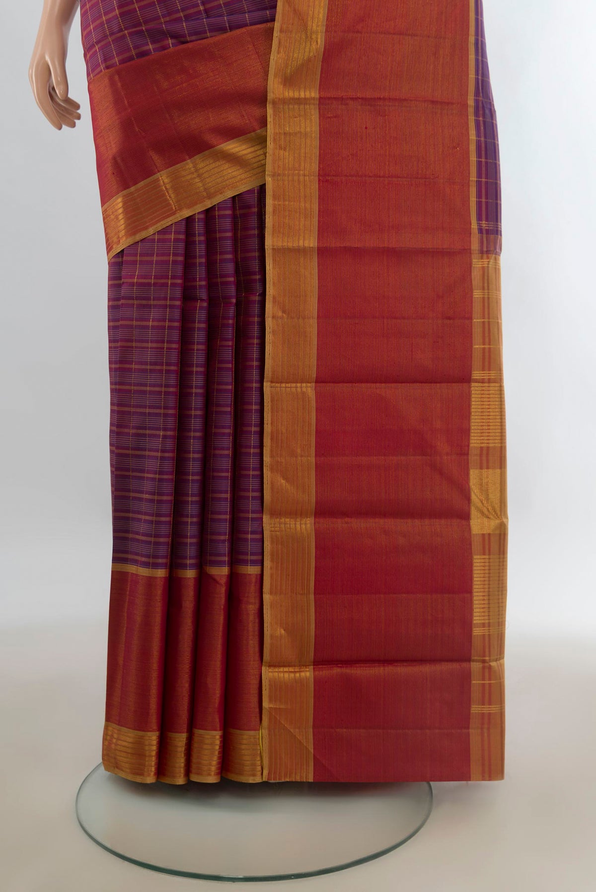 Pleats and pallu of Pure Silk Purple Kanchipuram Saree with Zari Butta on the body and Zari Border. 