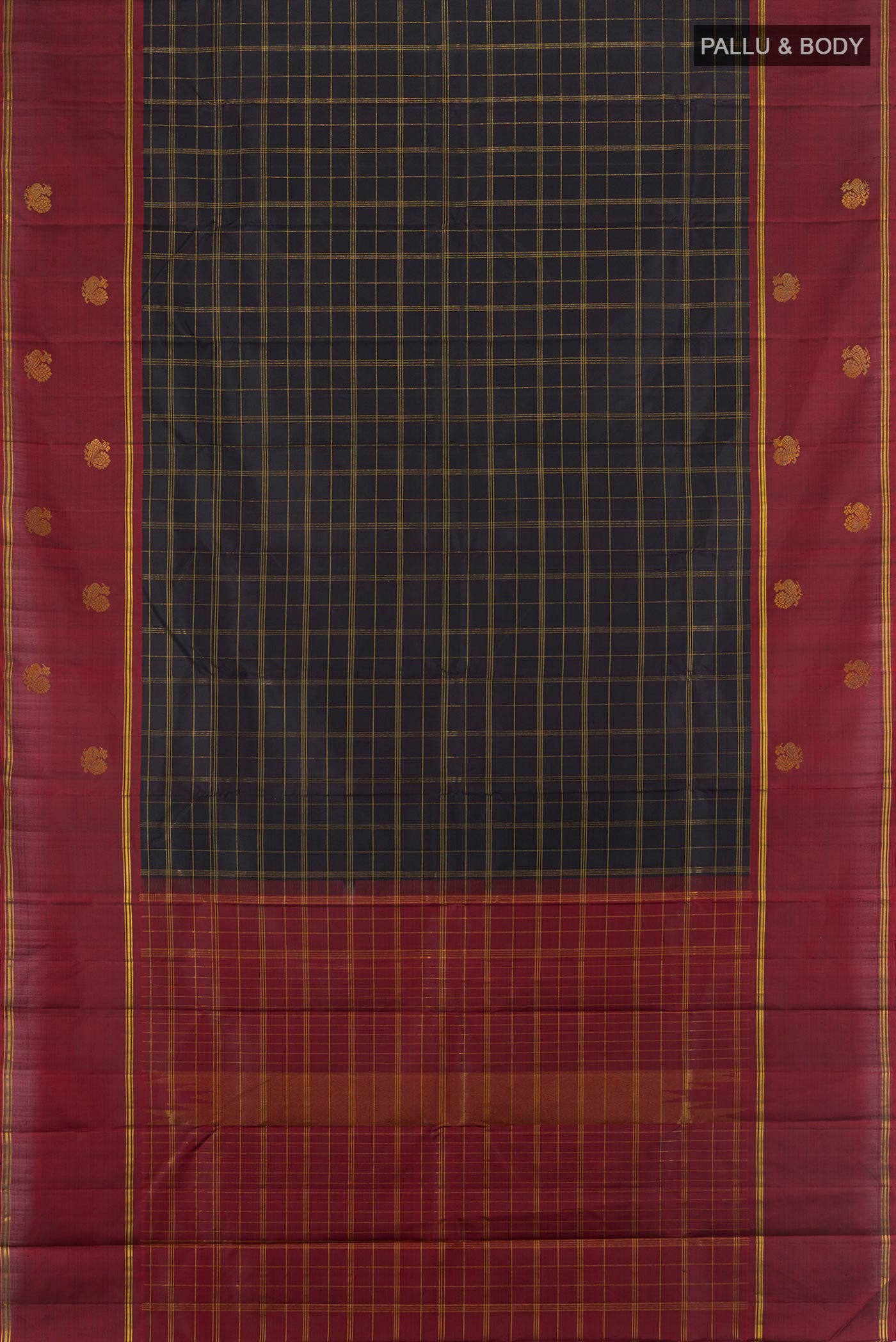 Flat view of Black Kanchipuram Silk Saree with Checked design on the body and Zari Border. 