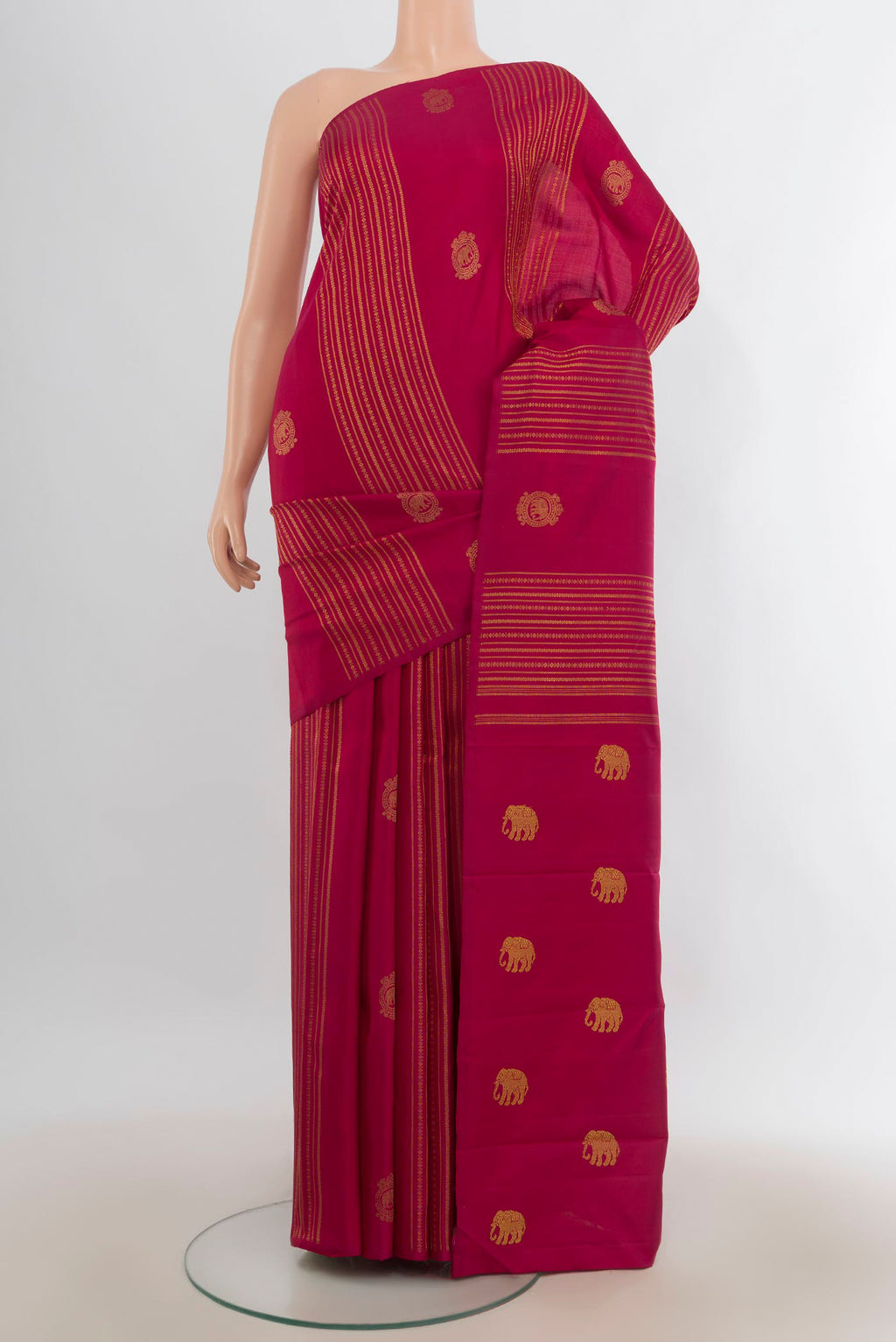 Pure Silk Pure Zari Deep Red Kanchipuram Saree with Zari Butta on the body and Without Border.  displayed on a mannequin