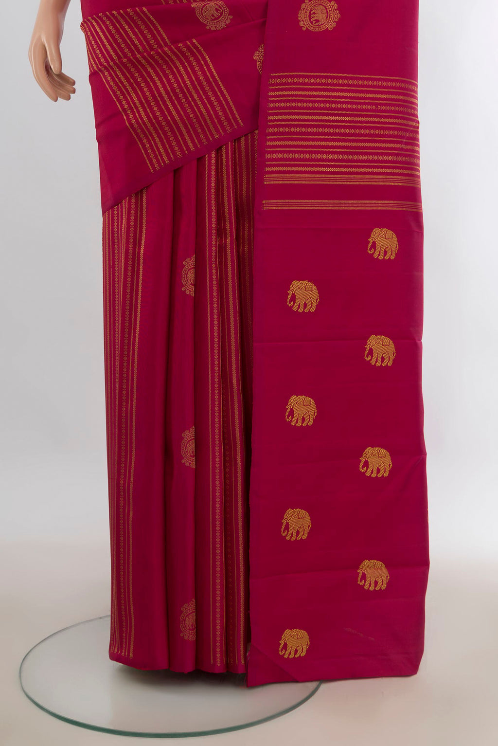 Pleats and pallu of Pure Silk Pure Zari Deep Red Kanchipuram Saree with Zari Butta on the body and Without Border. 