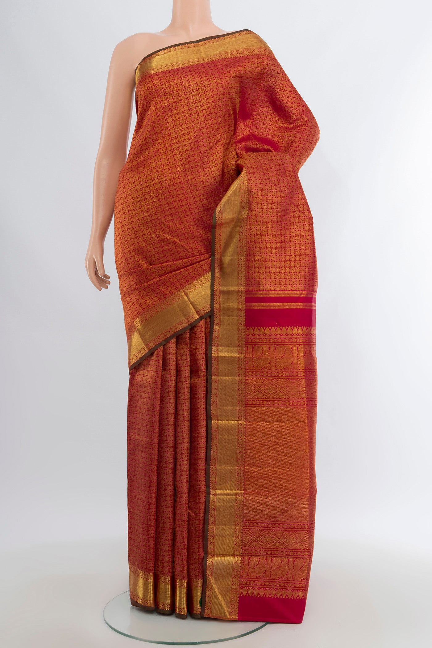 Pure Silk Pure Zari Maroon Kanjivaram Saree with Zari Brocade on the body and Zari Border.  displayed on a mannequin