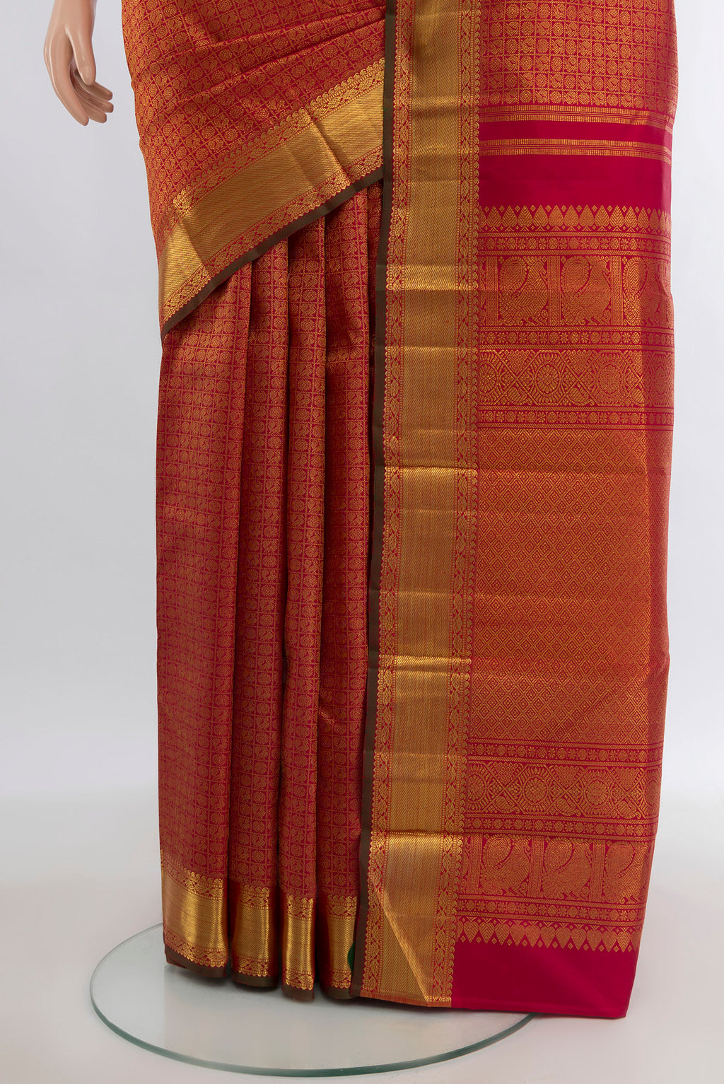 Pleats and pallu of Pure Silk Pure Zari Maroon Kanjivaram Saree with Zari Brocade on the body and Zari Border. 
