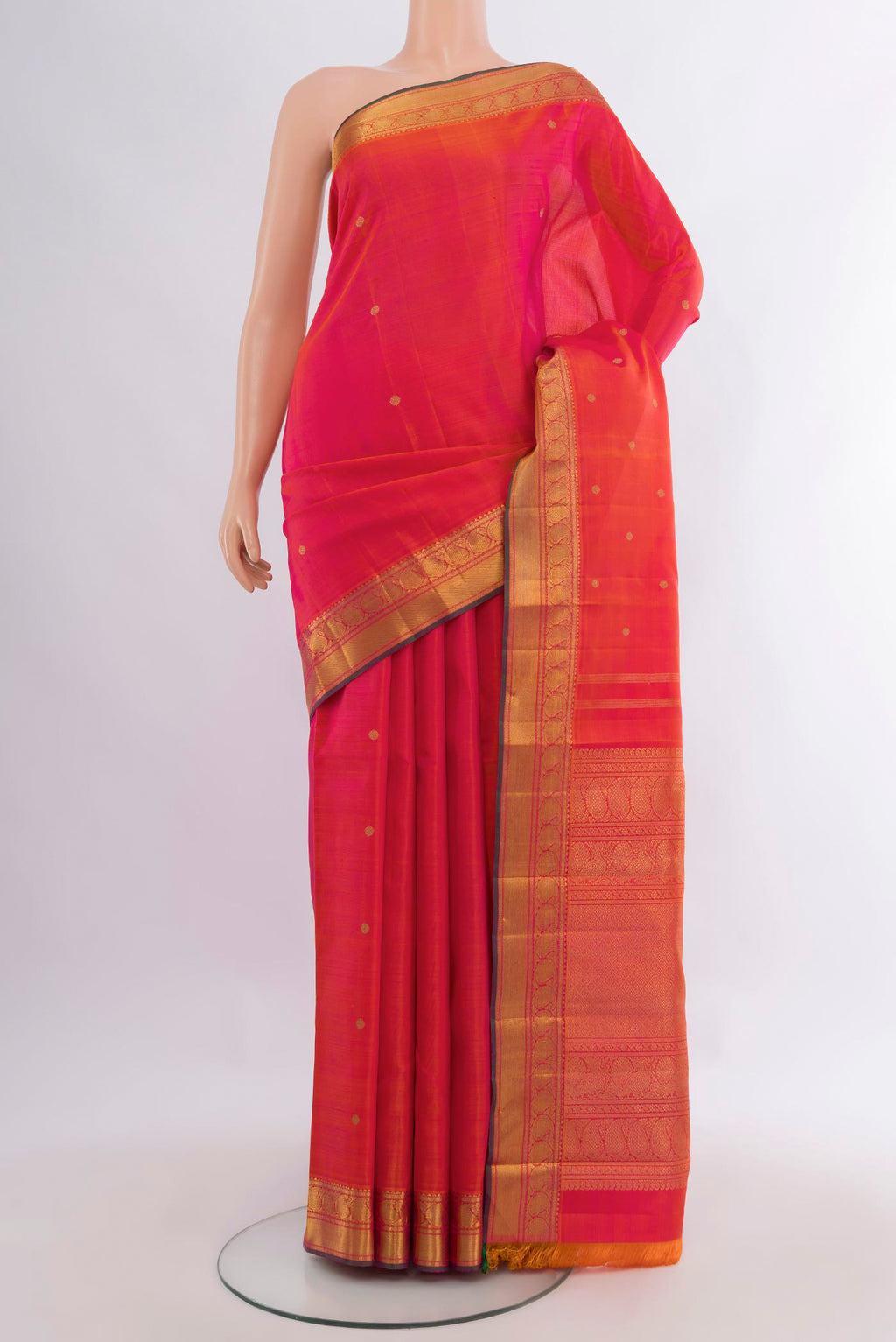 Pure Silk Pure Zari Pink Dual Tone Kanjivaram Saree with Zari Butta on the body and Zari Border.  displayed on a mannequin