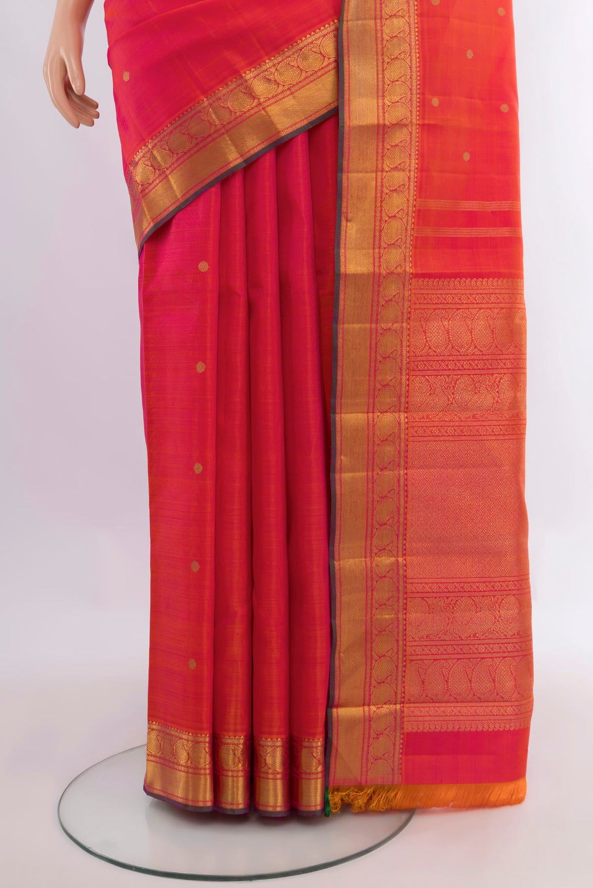 Pleats and pallu of Pure Silk Pure Zari Pink Dual Tone Kanjivaram Saree with Zari Butta on the body and Zari Border. 