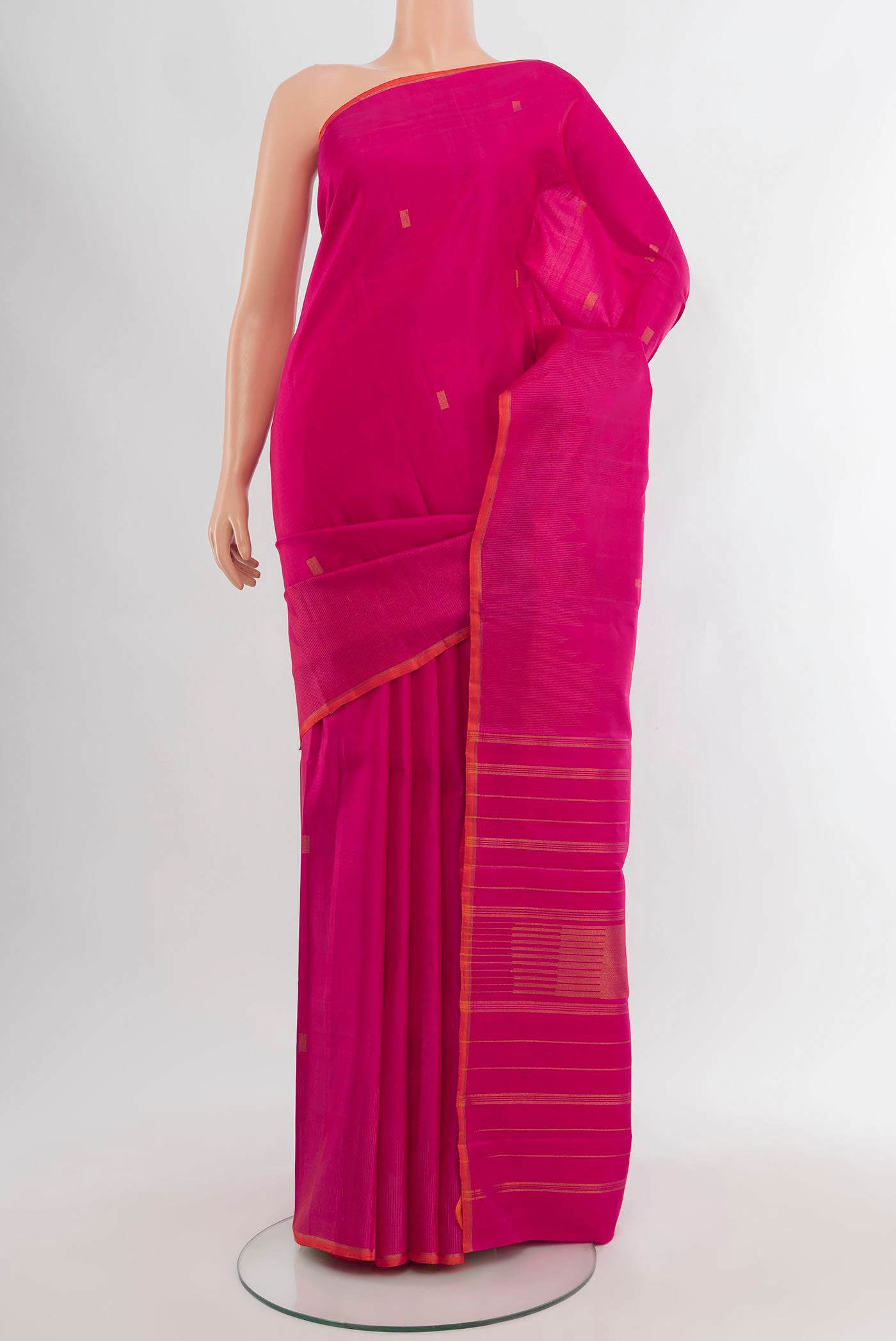 Pure Silk Pure Zari Pink Kanchipuram Saree with Zari Butta on the body and Without Border.  displayed on a mannequin