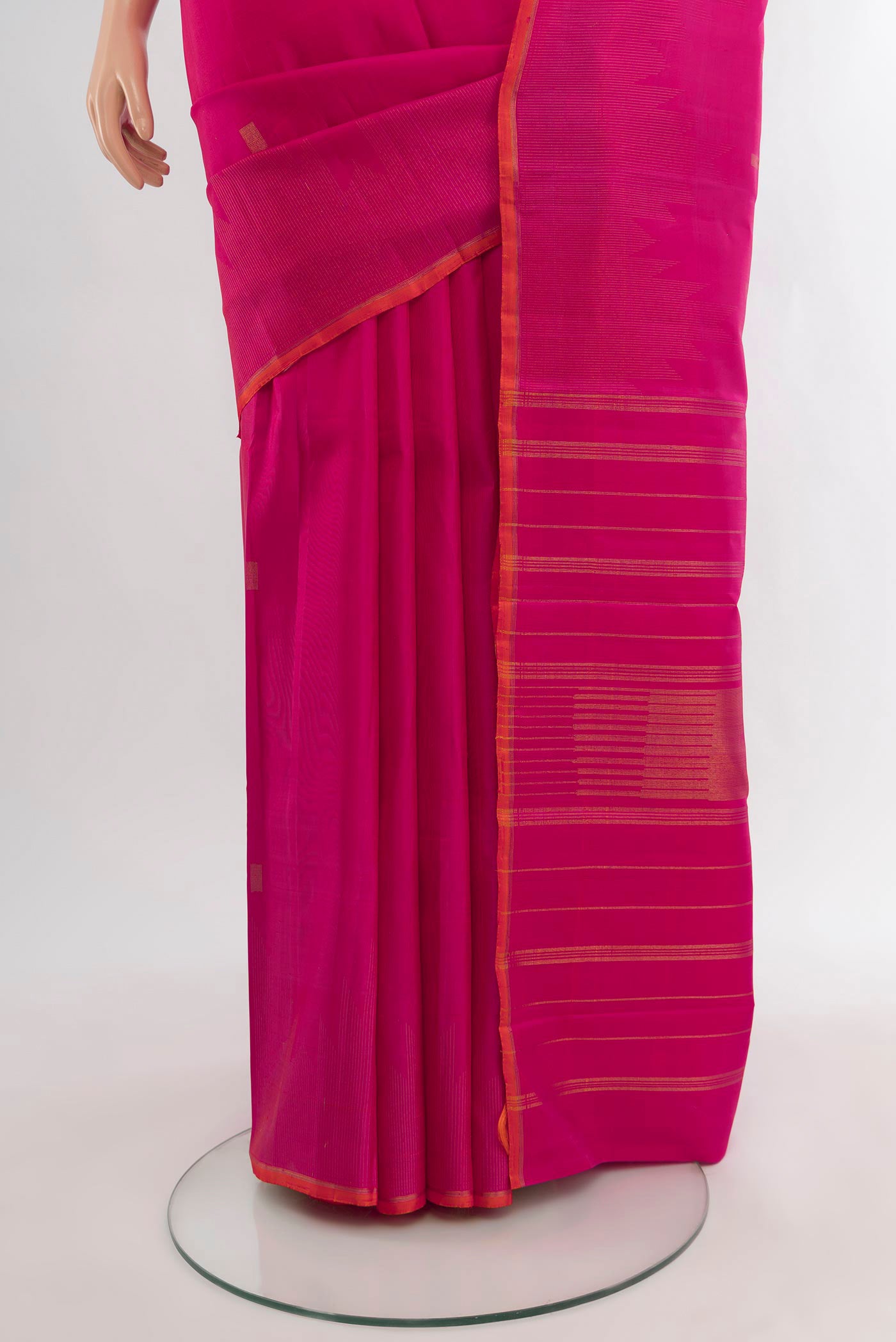Pleats and pallu of Pure Silk Pure Zari Pink Kanchipuram Saree with Zari Butta on the body and Without Border. 