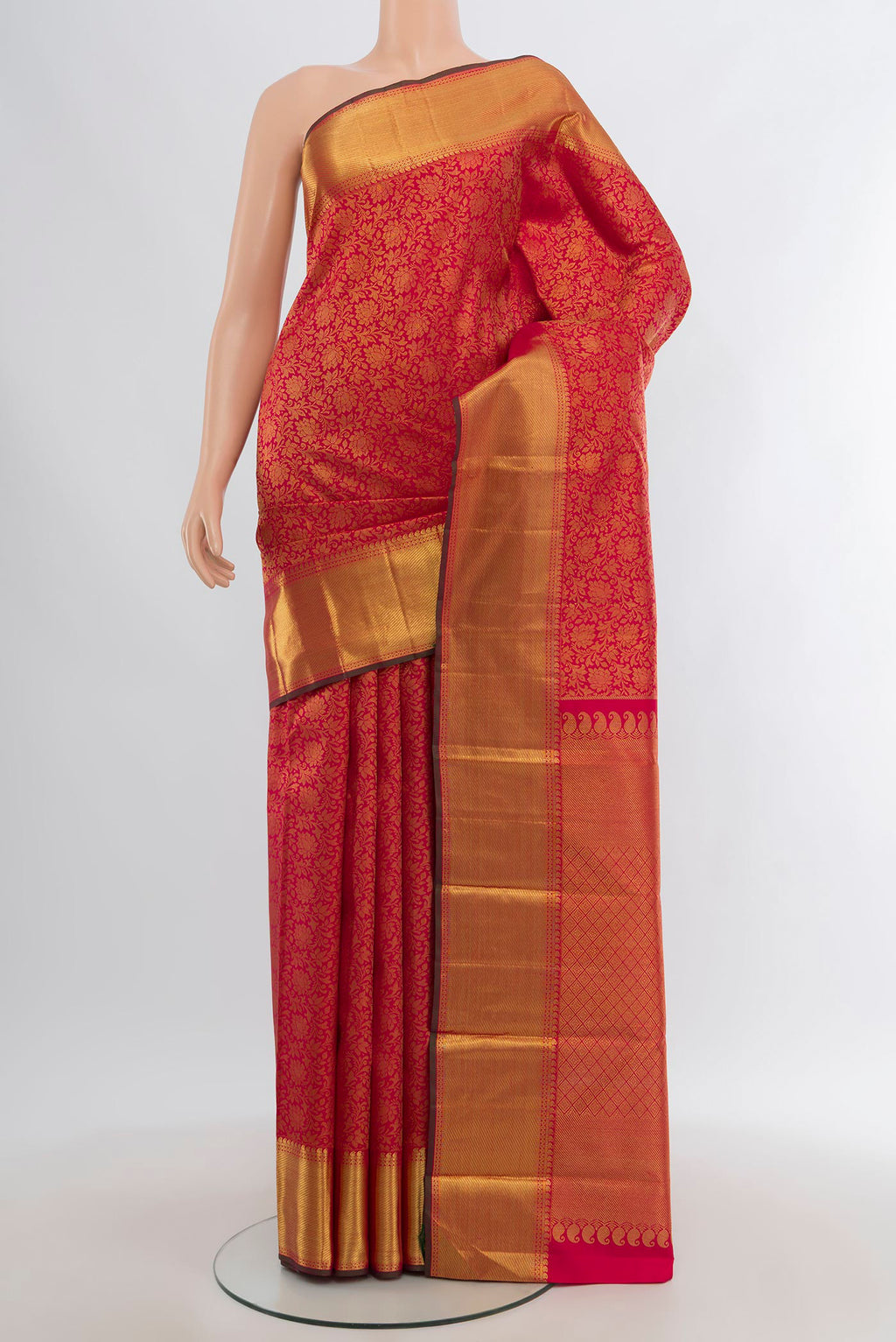 Pure Silk Pure Zari Dark Pink Kanjivaram Saree with Zari Brocade on the body and Zari Border.  displayed on a mannequin