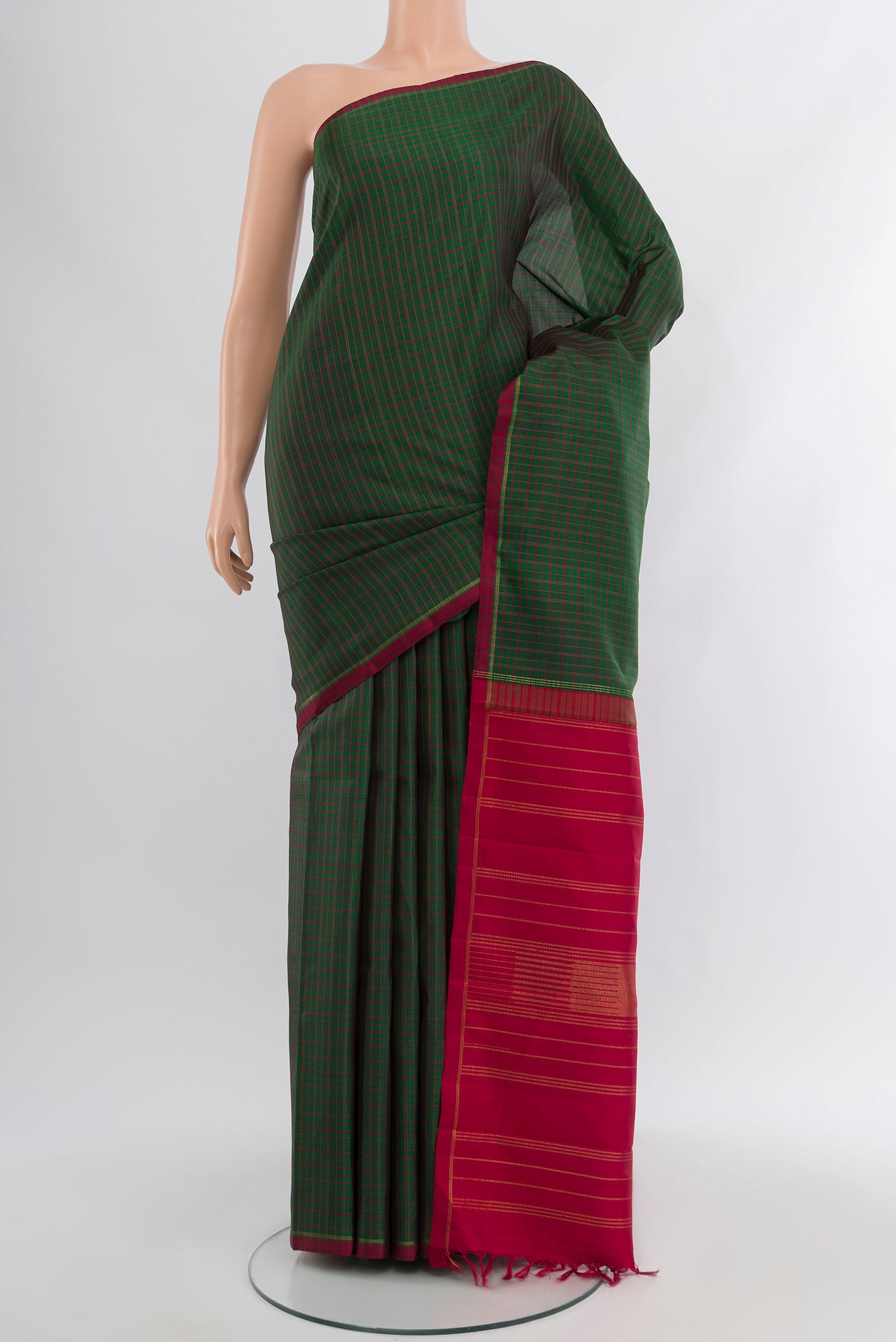 Pure Silk Pure Zari Bottle Green Kanjivaram Saree with Checked design on the body and Plain Border.  displayed on a mannequin